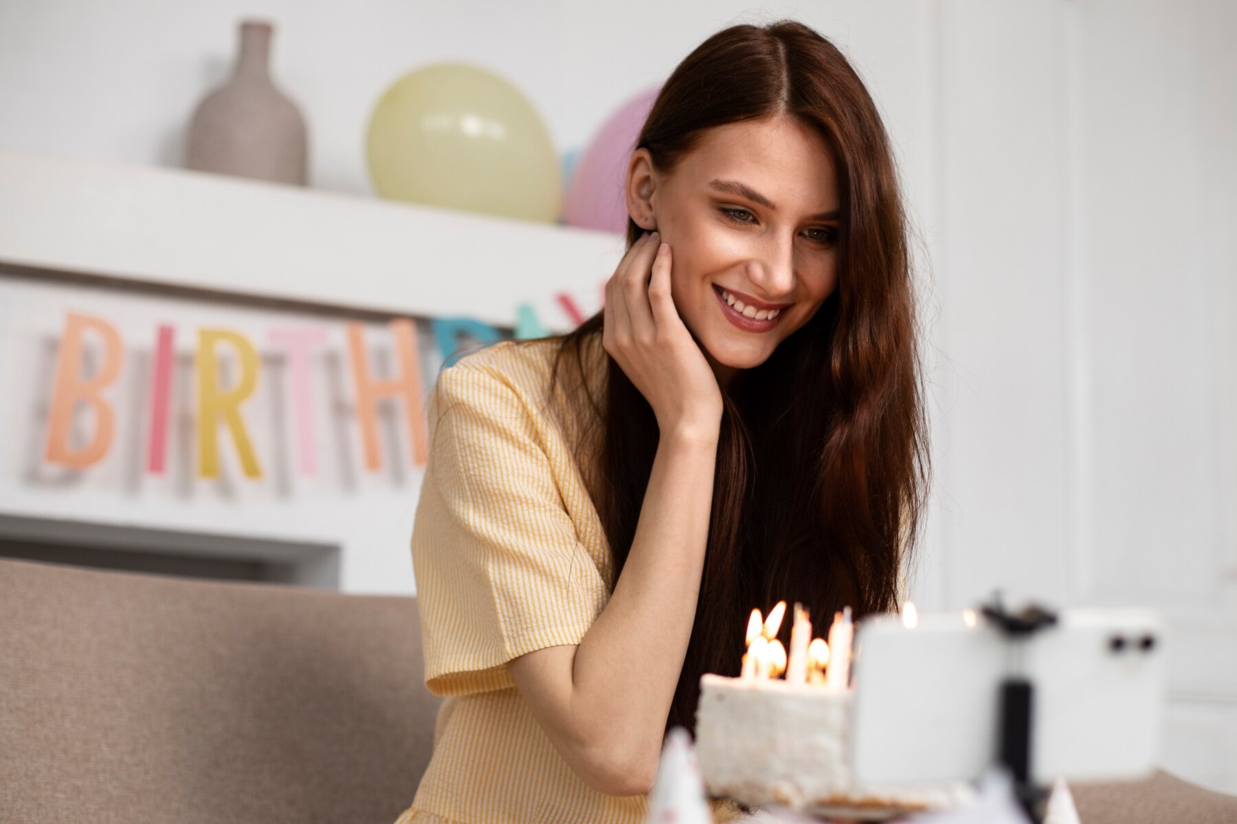 A woman blowing put candles | Source: Freepik