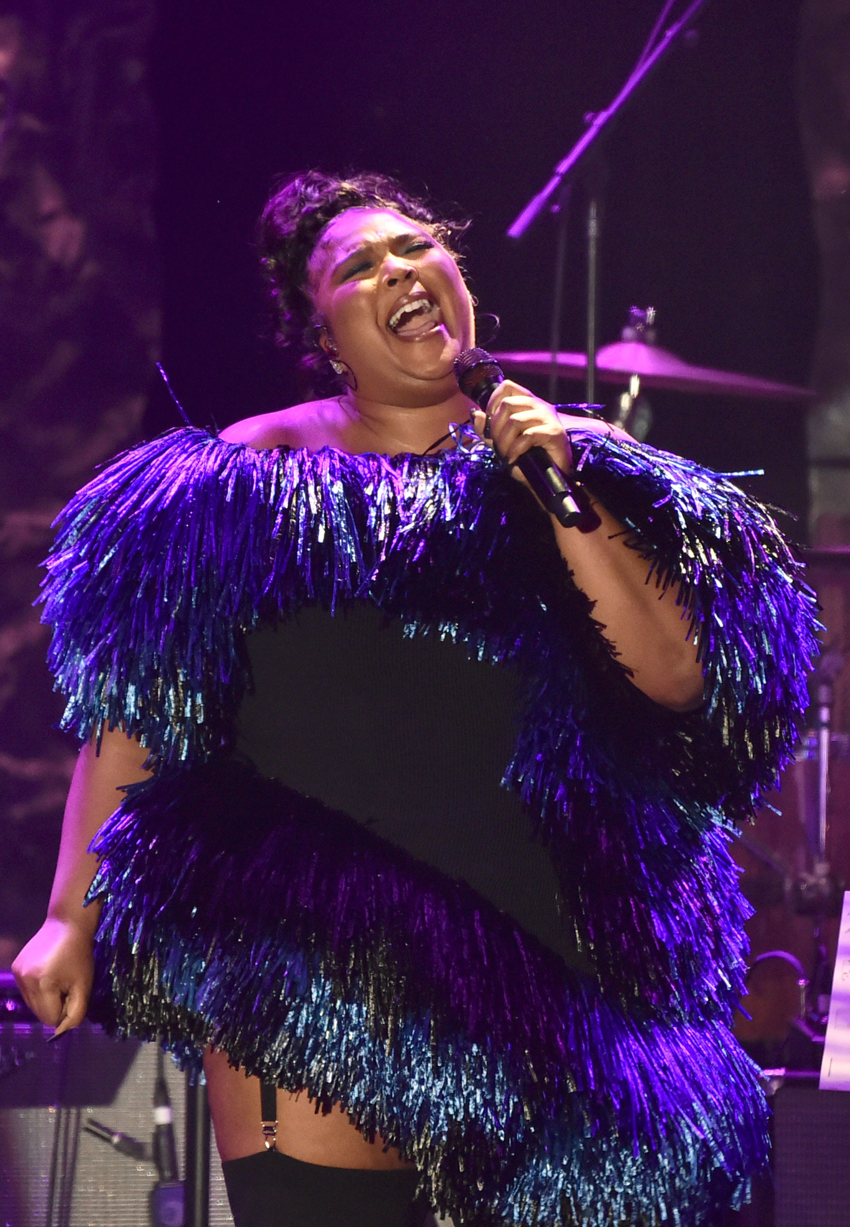 Lizzo performs onstage during the Pre-GRAMMY Gala & GRAMMY Salute on February 04, 2023 in Los Angeles, California. | Source: Getty Images