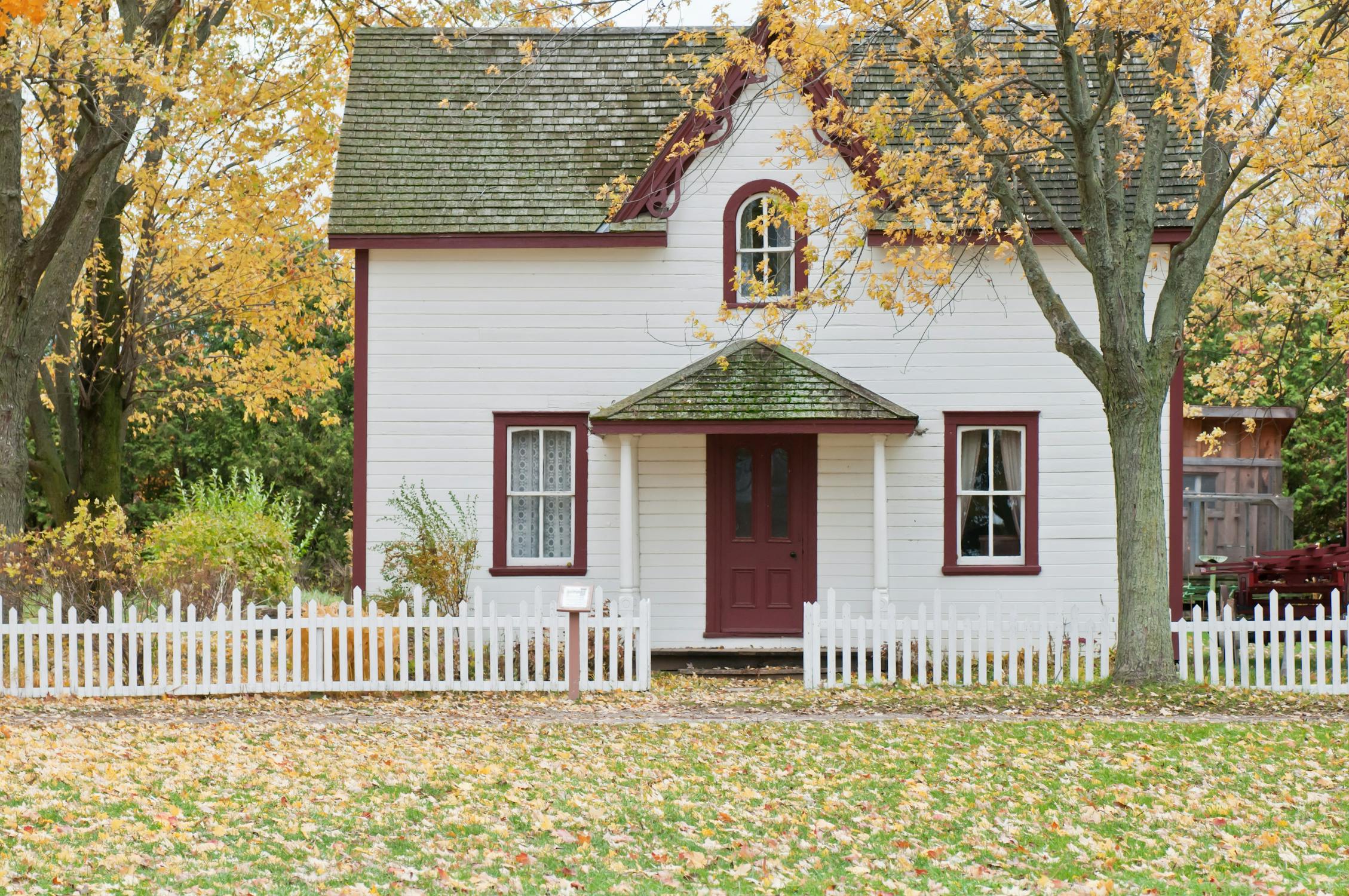 A wooden house with a fence | Source: Pexels