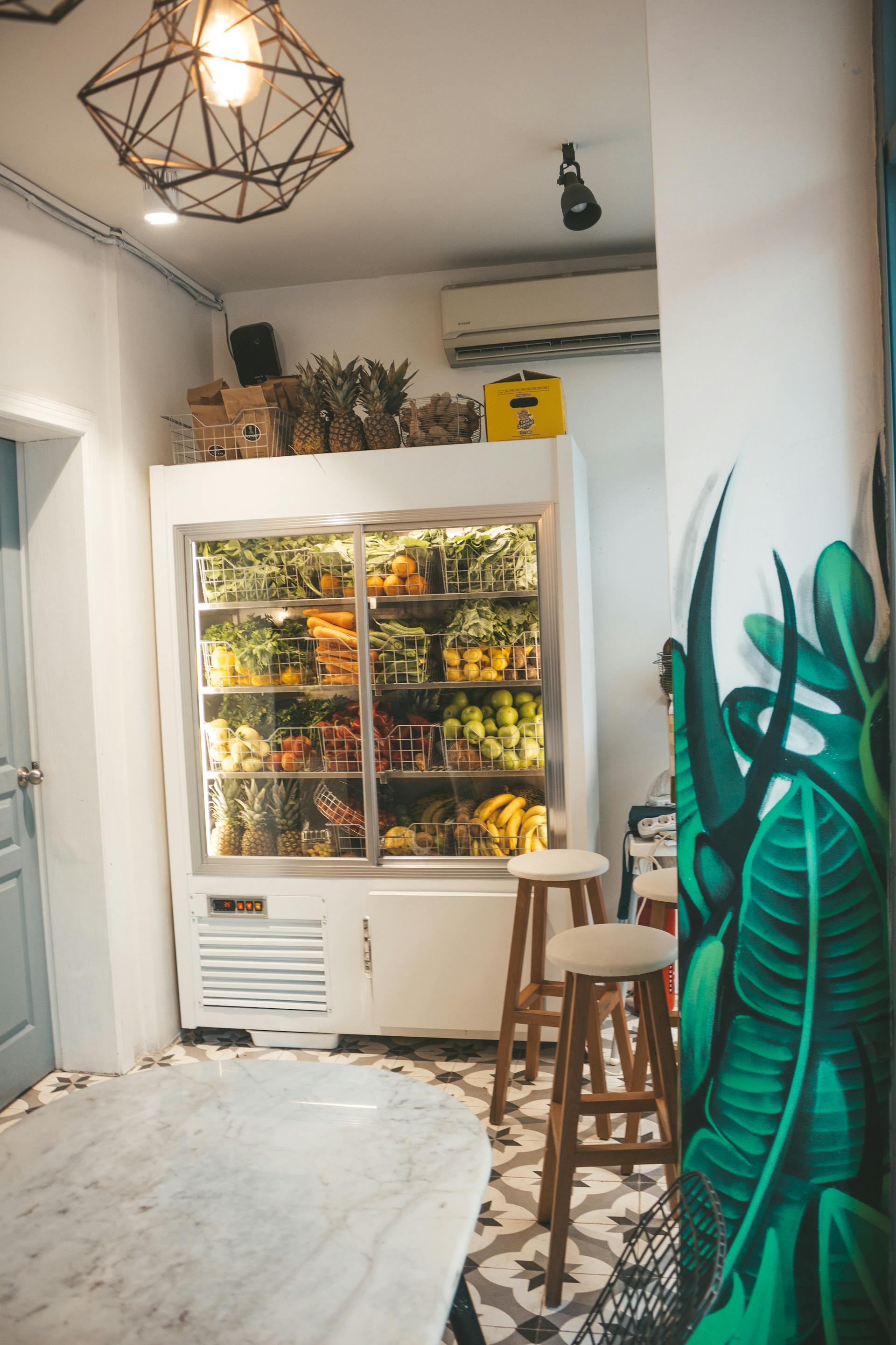A refrigerator stocked with fruits and vegetables | Source: Pexels