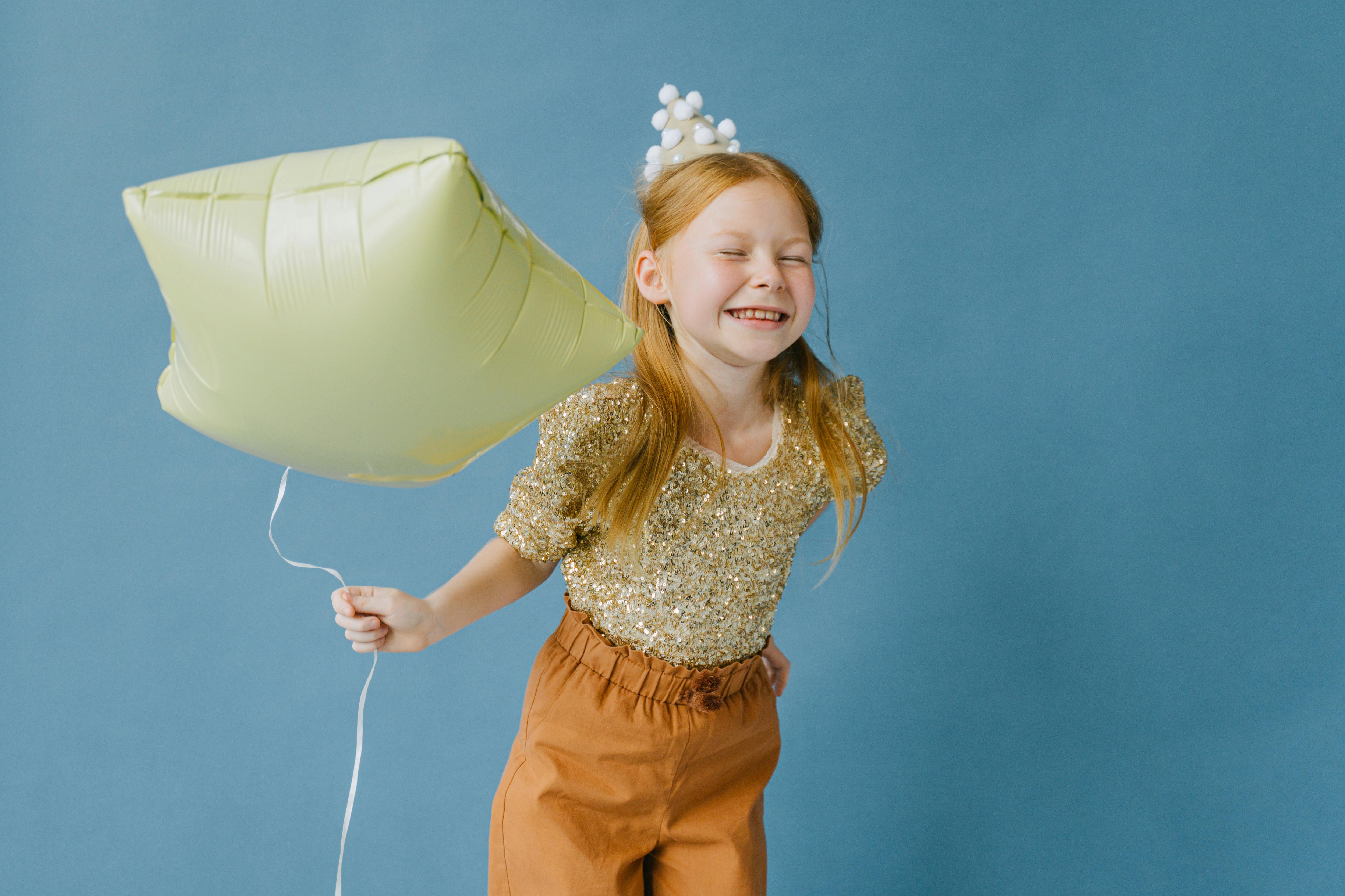 A happy girl at her birthday party | Source: Pexels
