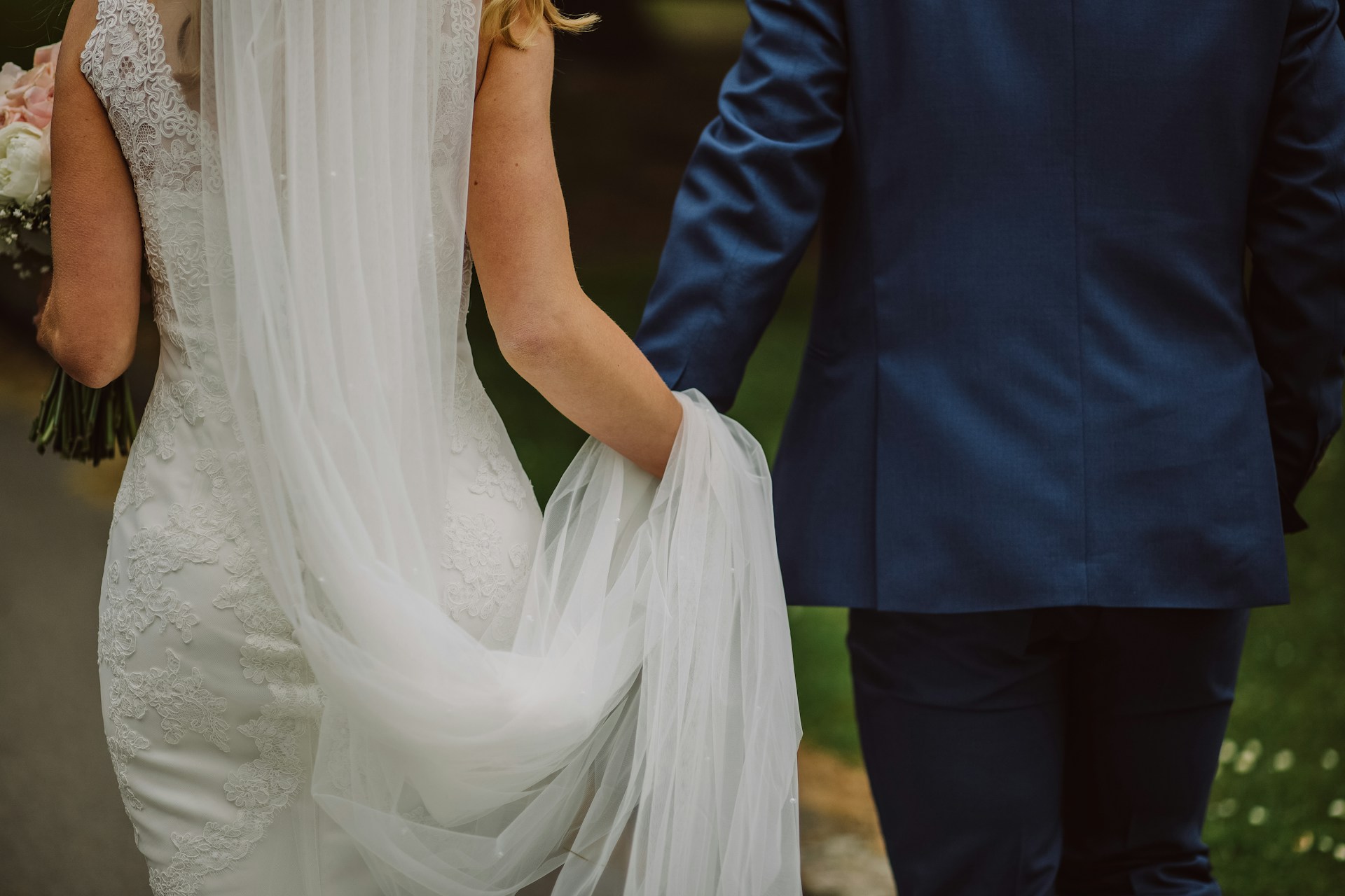 A bride walking with her groom | Source: Unsplash