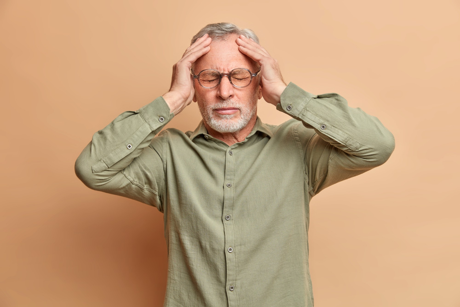 A stressed senior man | Source: Freepik