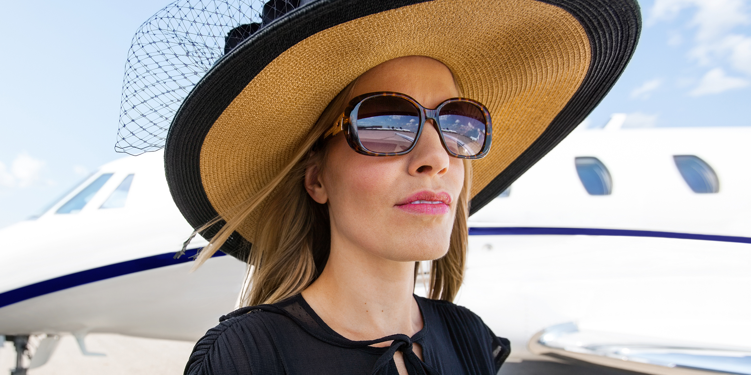 A woman wearing a sun hat | Source: Shutterstock