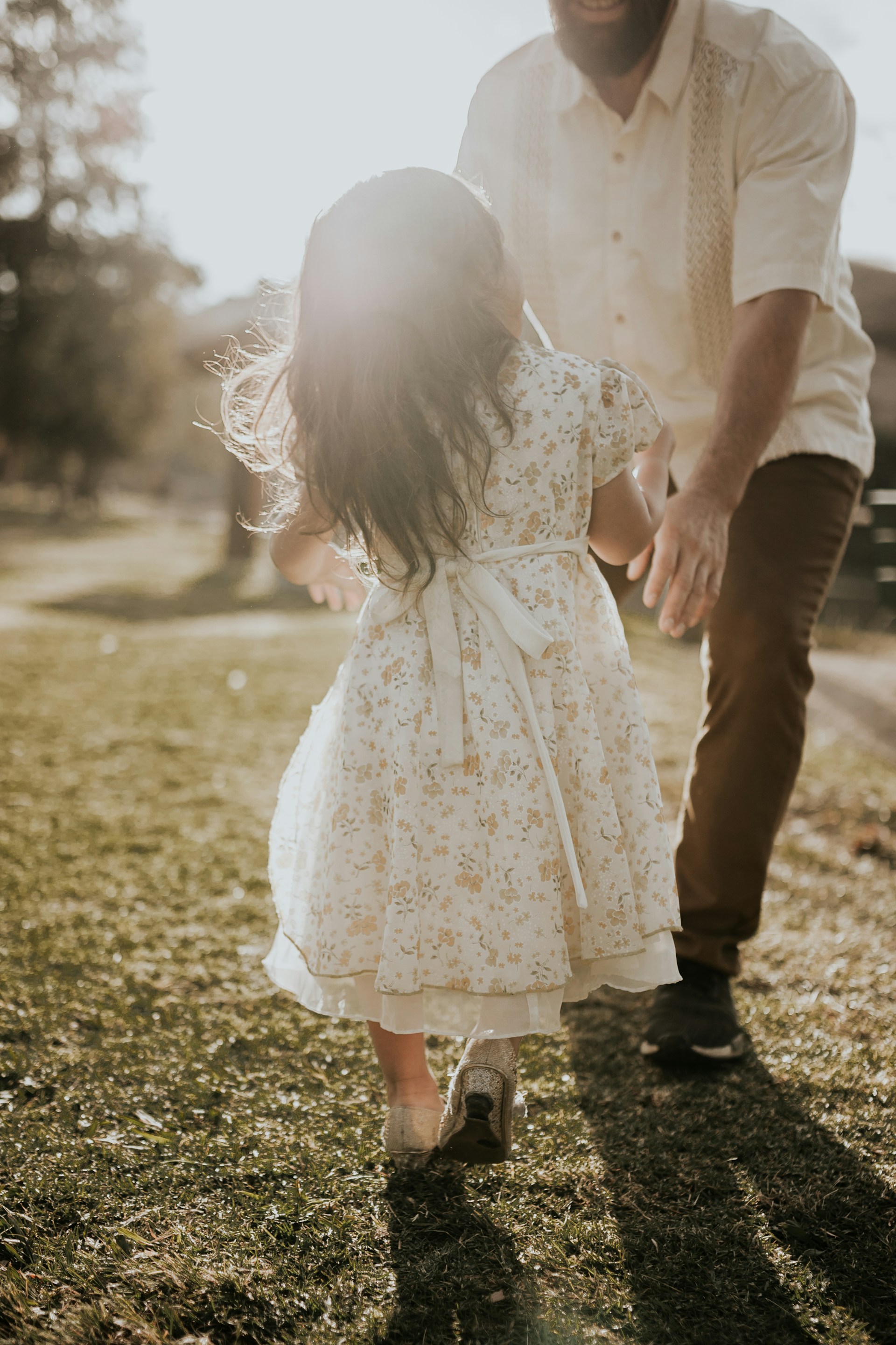 A little girl running toward a man | Source: Unsplash