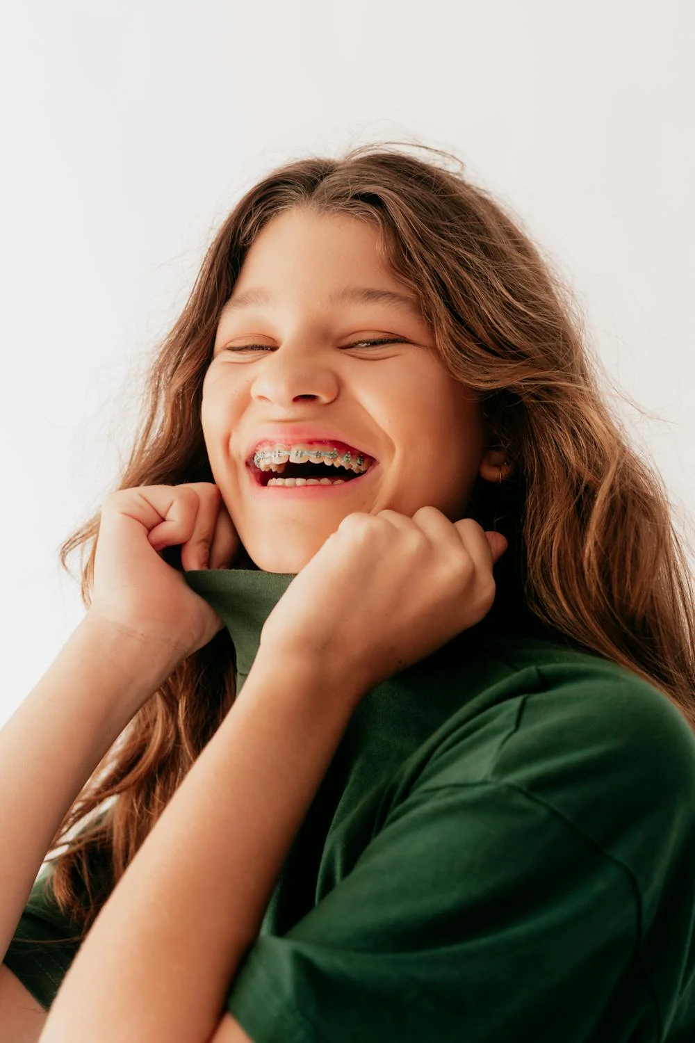 A laughing young woman | Source: Pexels