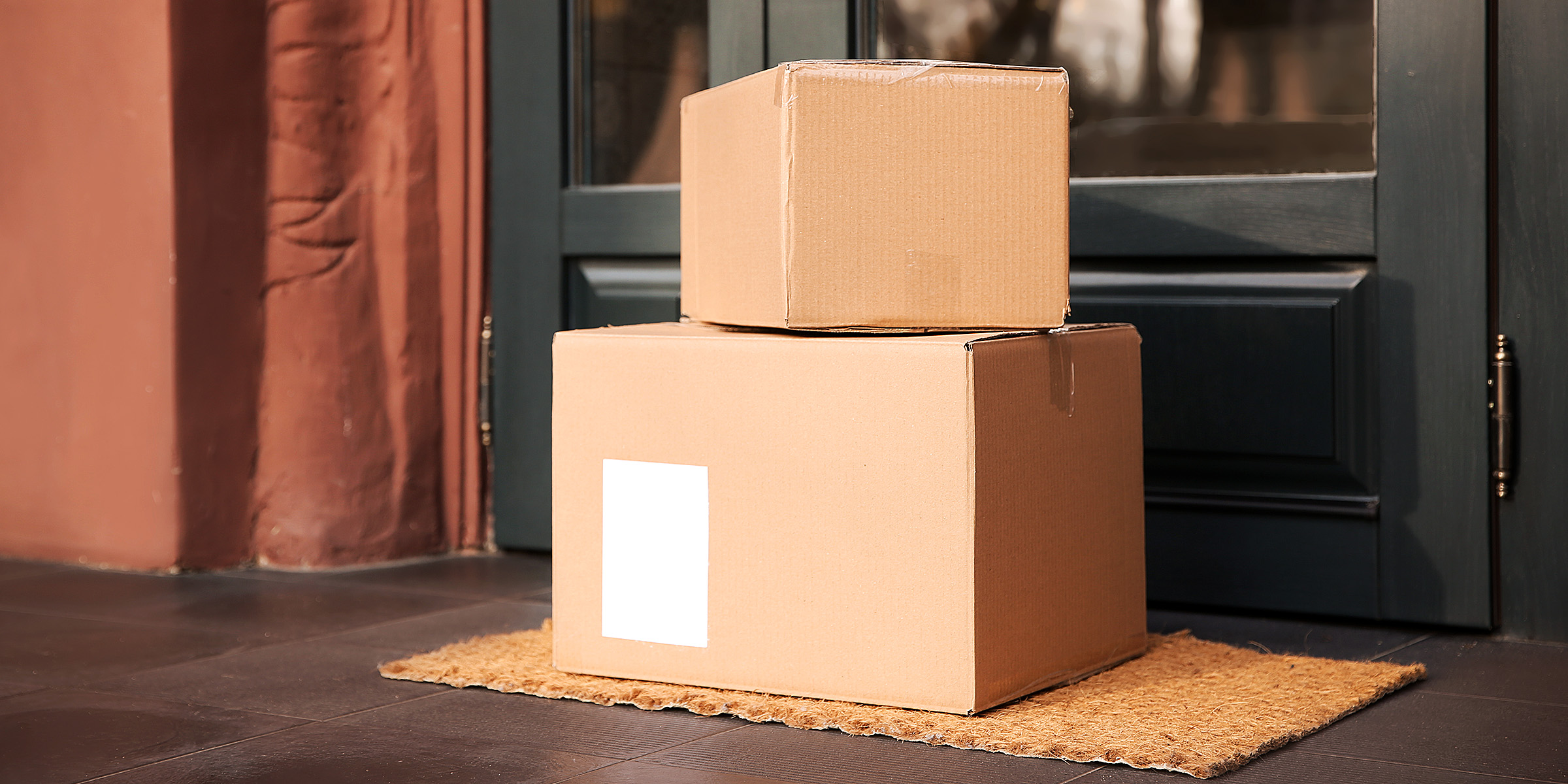 Boxes on a doorstep | Source: Shutterstock
