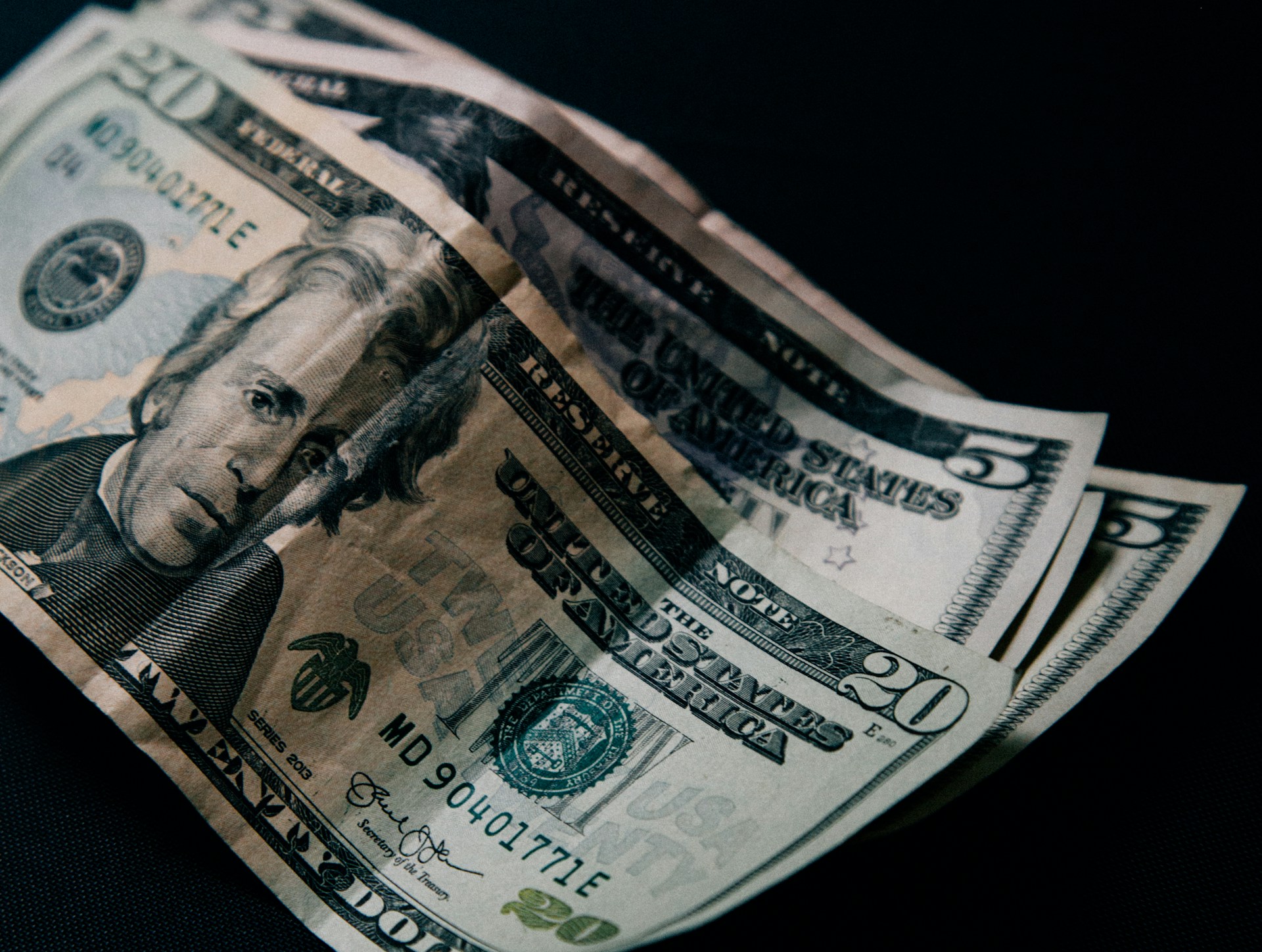 Dollar bills | Source: Unsplash