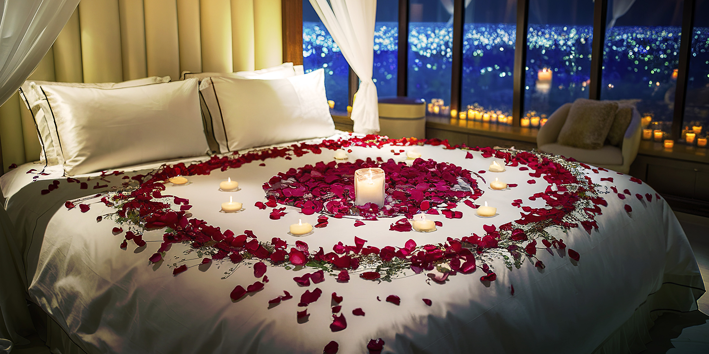 A bed covered in roses and candles | Source: Shutterstock