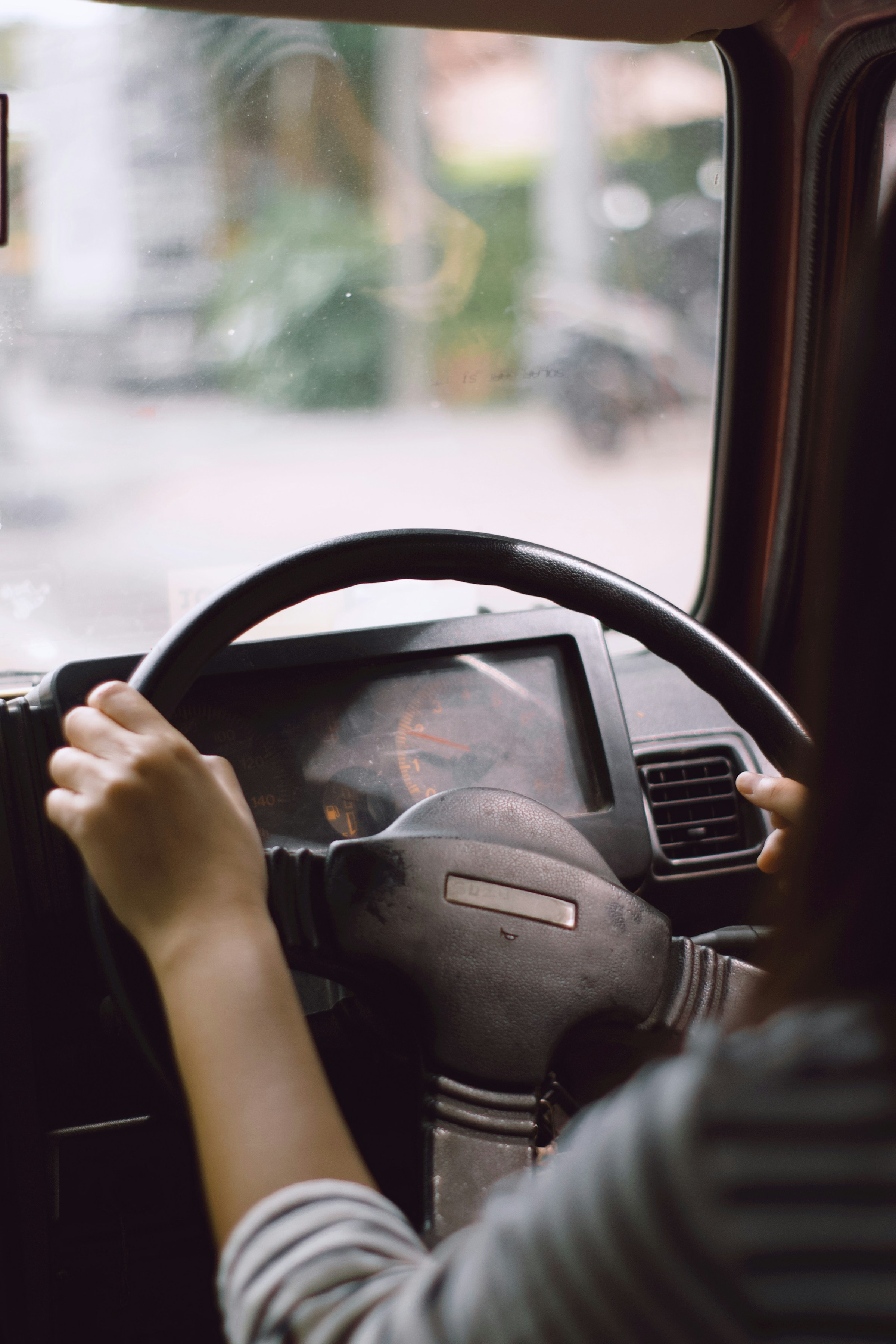 A woman driving a car | Source: Unsplash