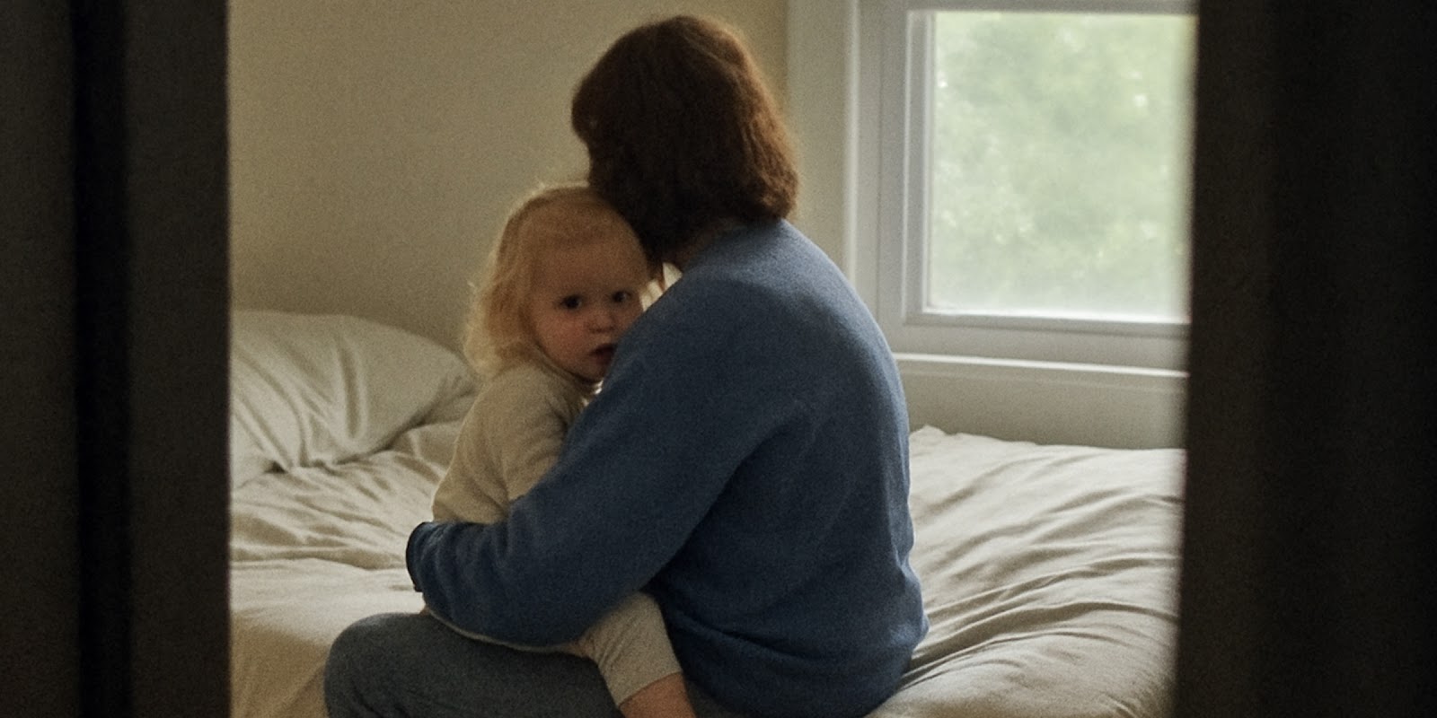 A woman with a child. | Source: Sora