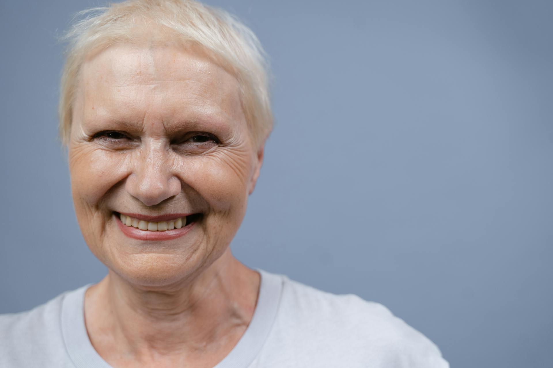 A woman smiling triumphantly | Source: Pexels