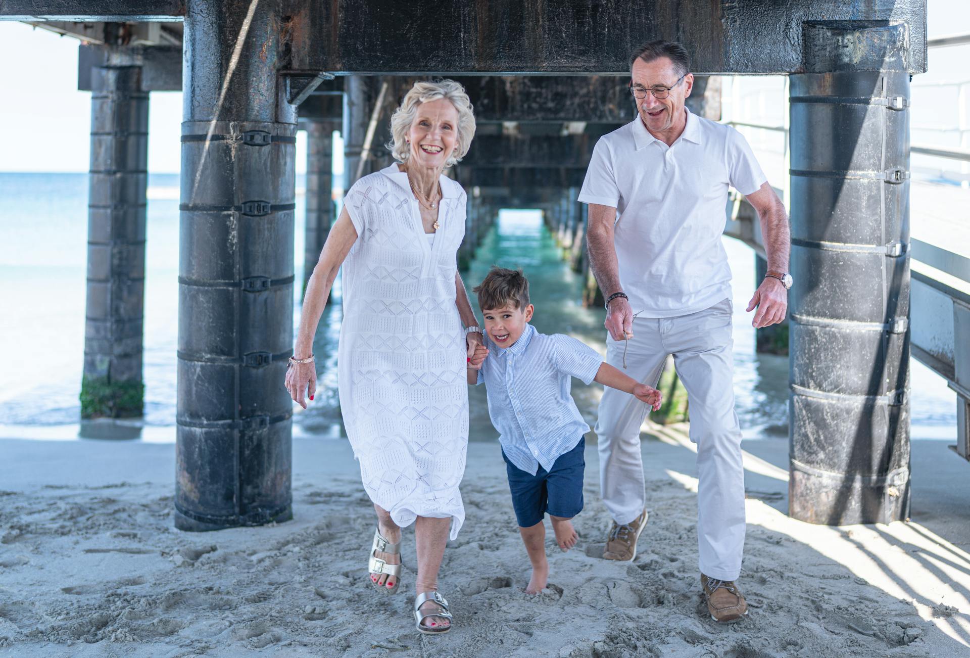 Happy grandparents with their grandson | Source: Pexels