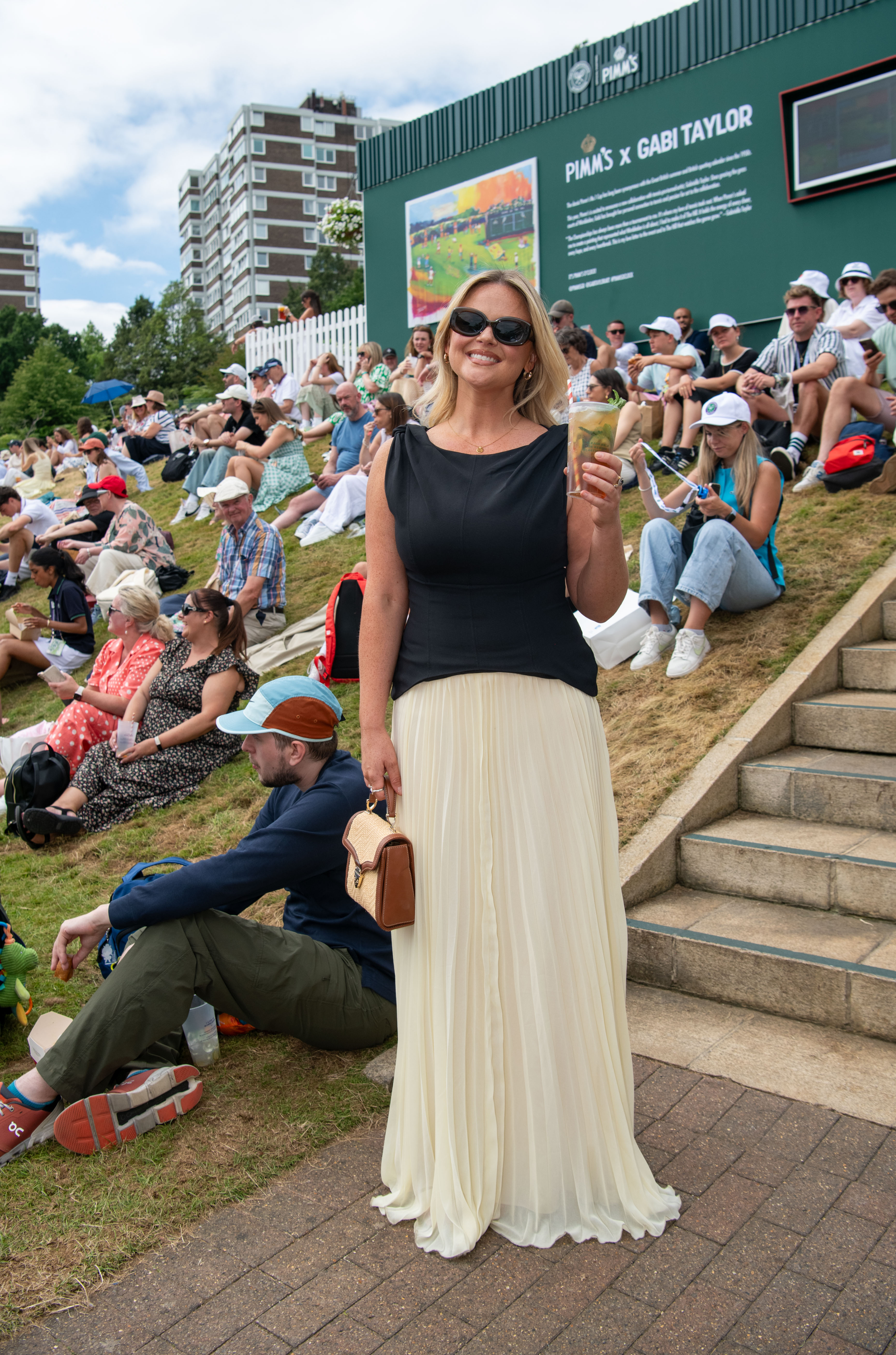 Emily Atack with Pimm's, an Official Partner of Wimbledon, at All England Lawn Tennis and Croquet Club on July 9, 2025 in London, England. | Source: Getty Images