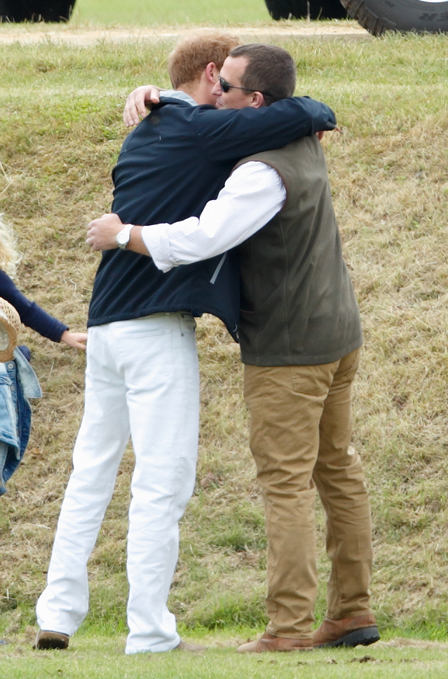 Peter Phillips greets Prince Harry as they attend the Gigaset Charity Polo Match at the Beaufort Polo Club on June 14, 2015 in Tetbury, England. | Source: Getty Images