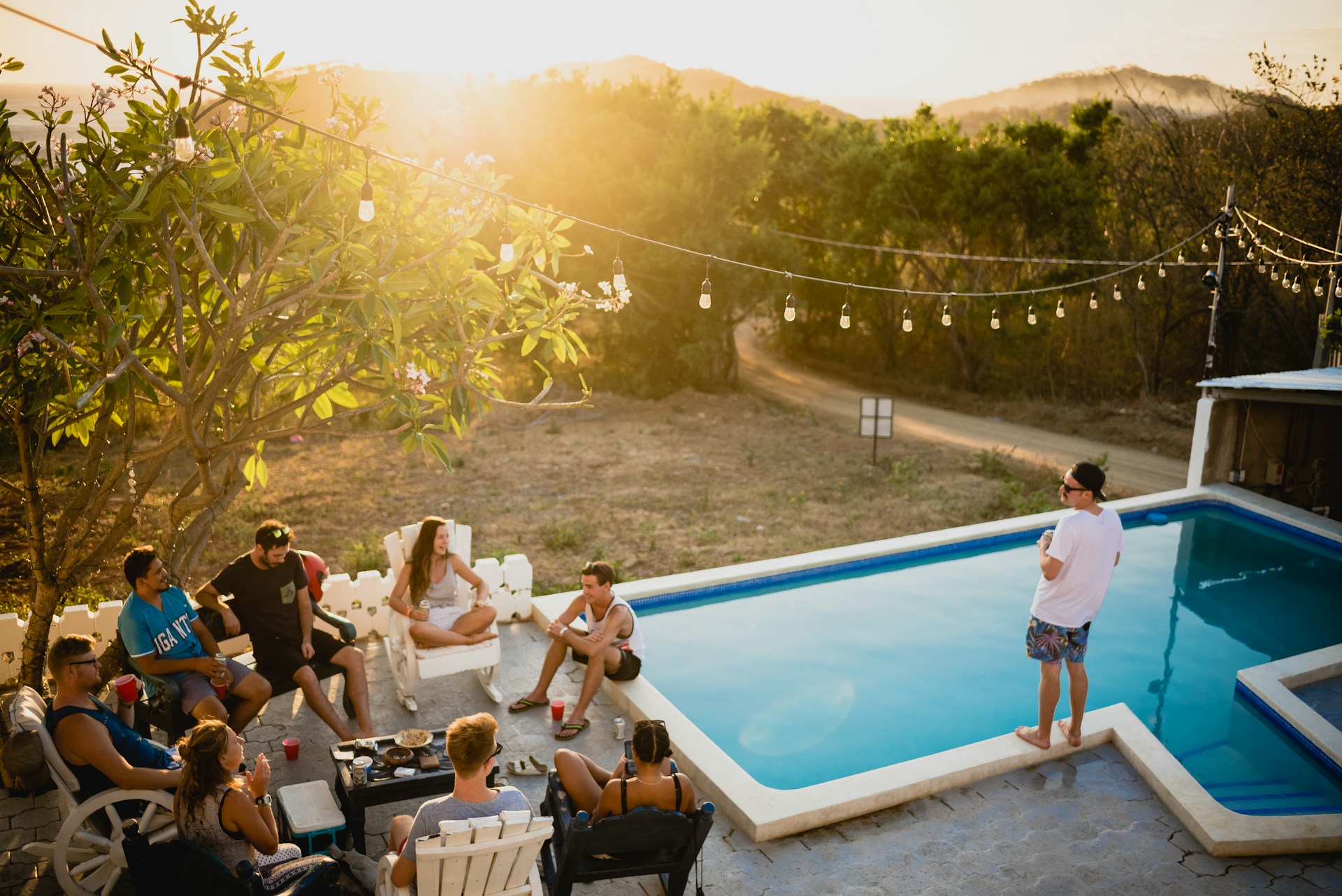 A group of people chilling at a pool party | Source: Unsplash