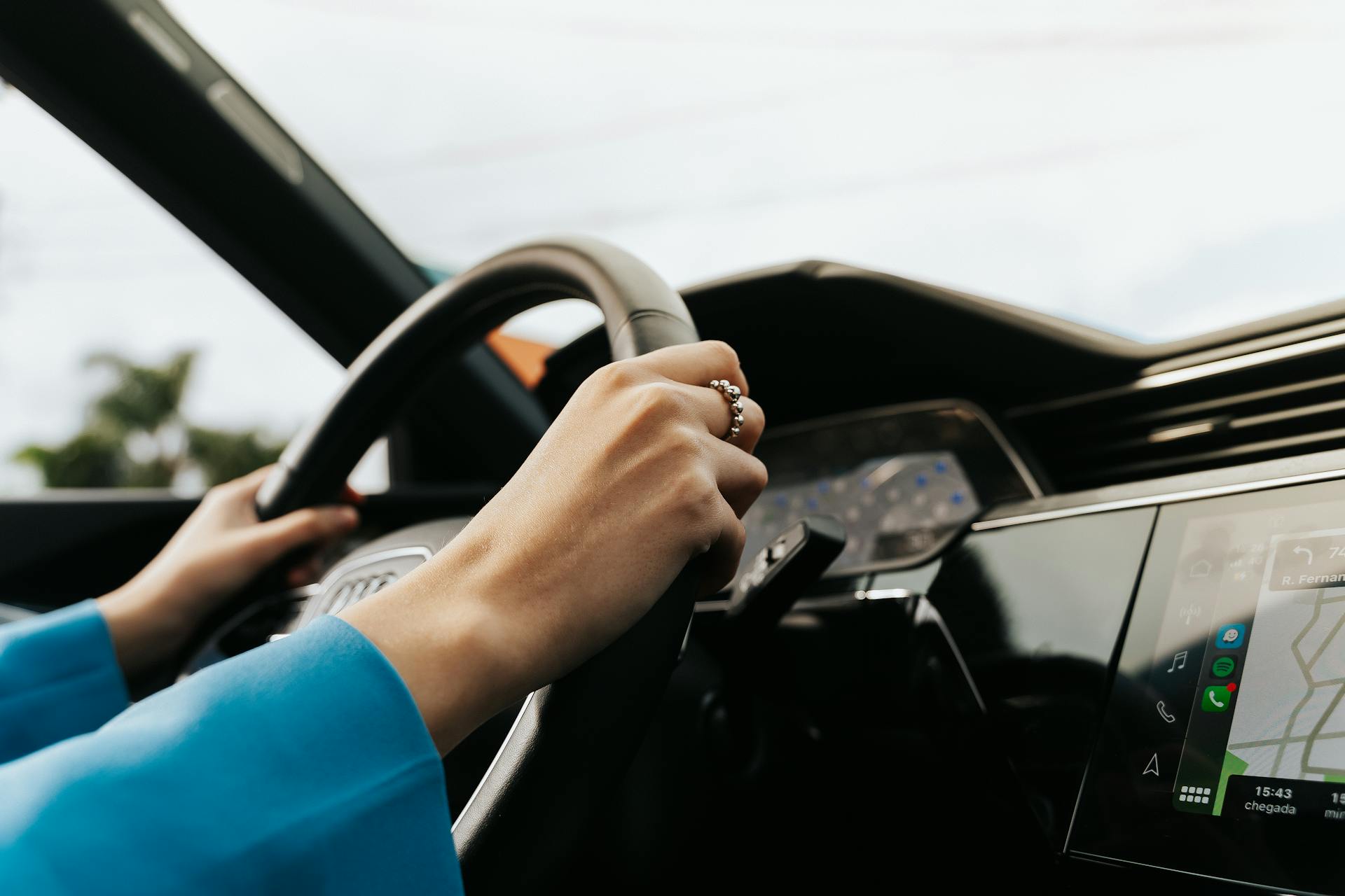 A woman driving a car | Source: Pexels