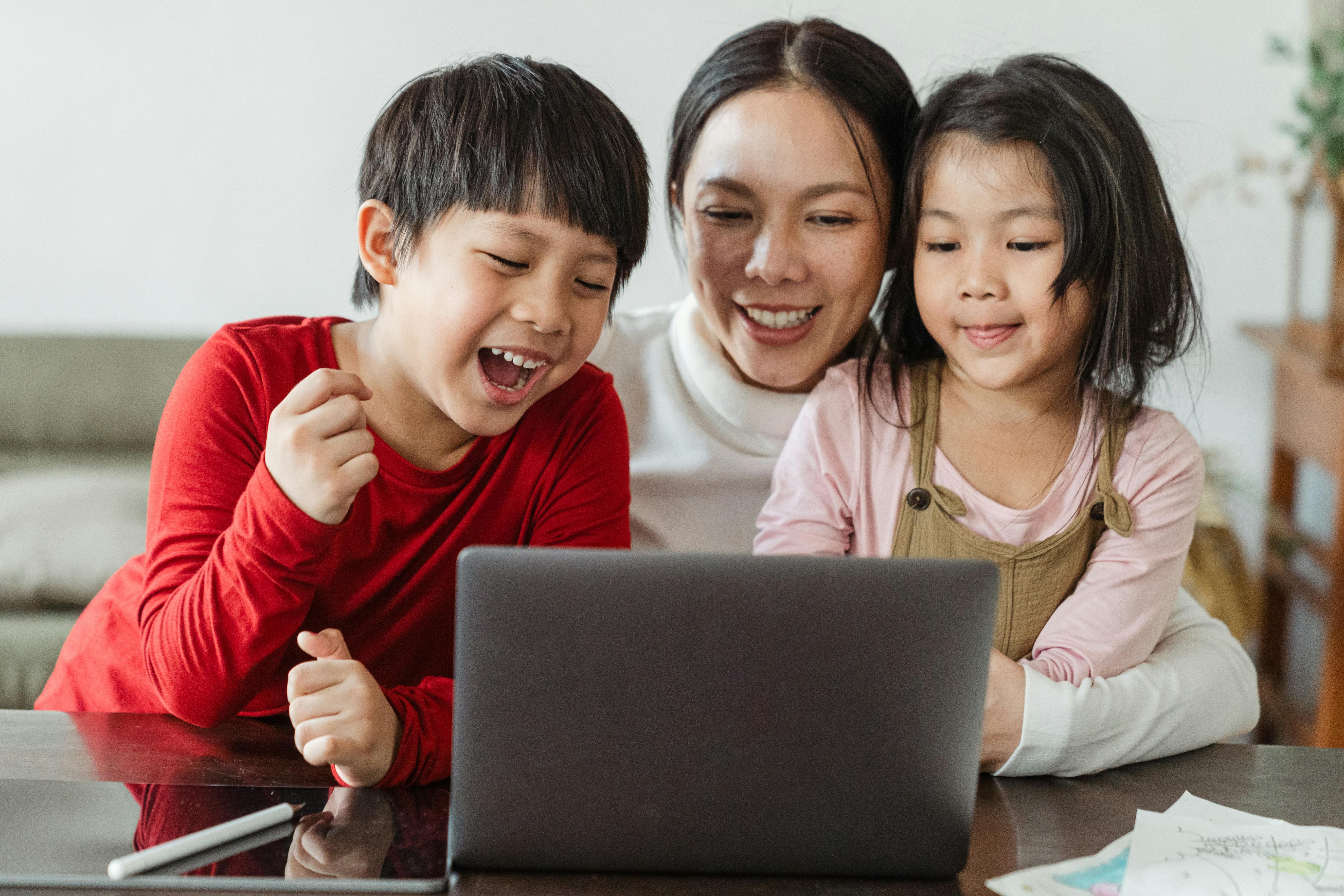A woman and her two kids spending time together | Source: Pexels