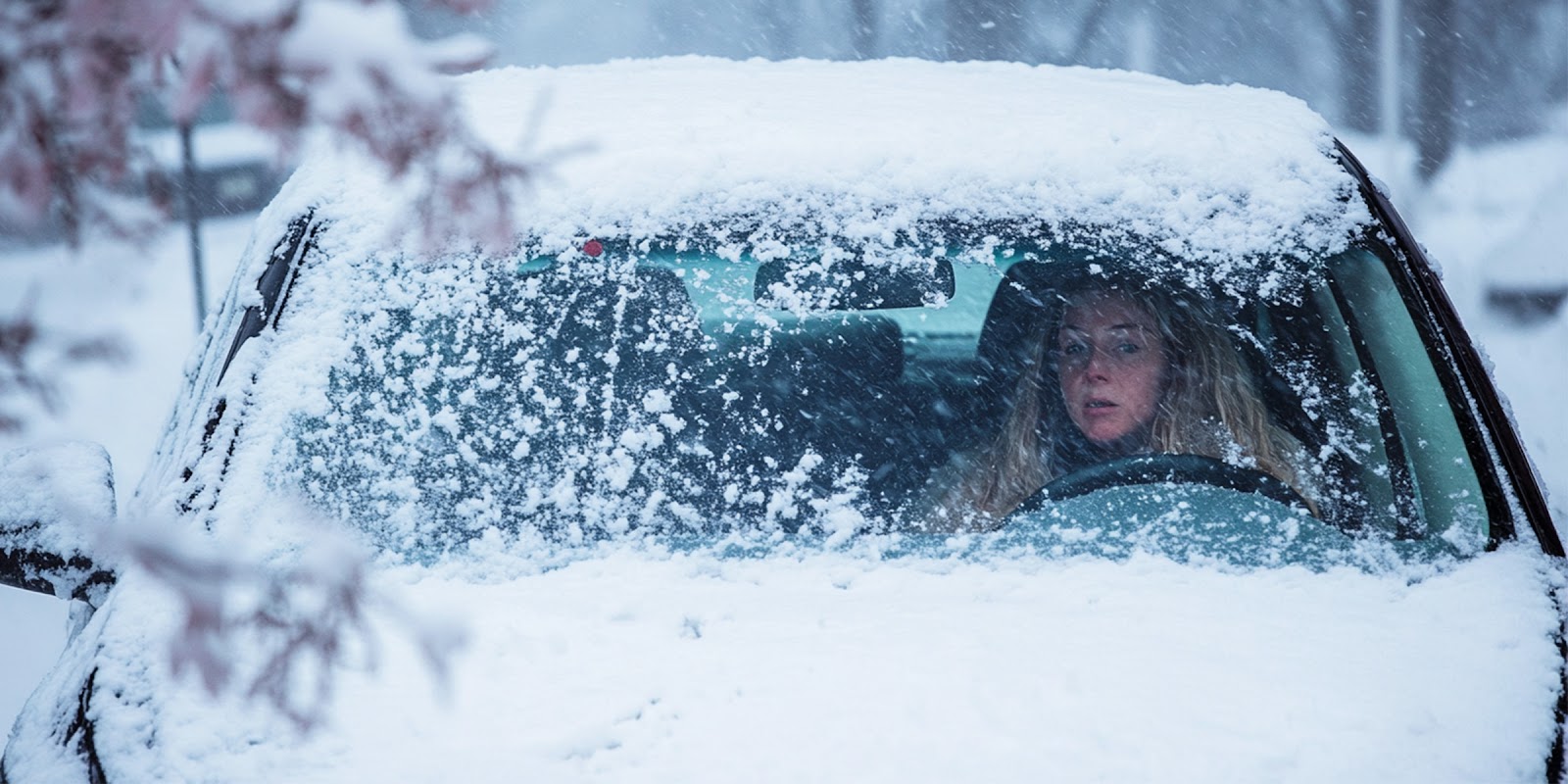 Car in snowstorm. | Source: Midjourney