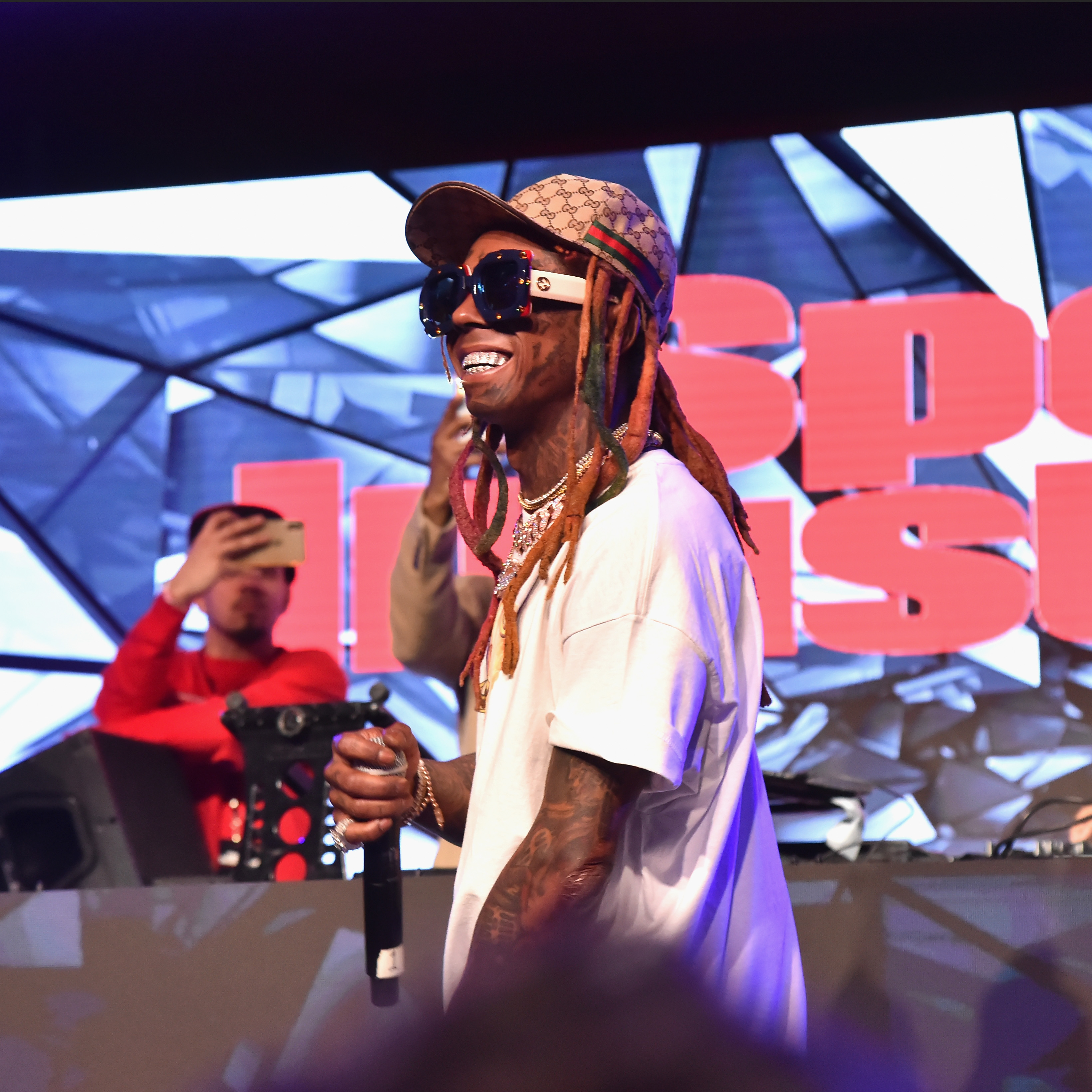 Lil Wayne performs at Sports Illustrated Saturday Night Lights powered by Matthew Gavin Enterprises and Talent Resources Sports on February 2, 2019, in Atlanta, Georgia | Source: Getty Images