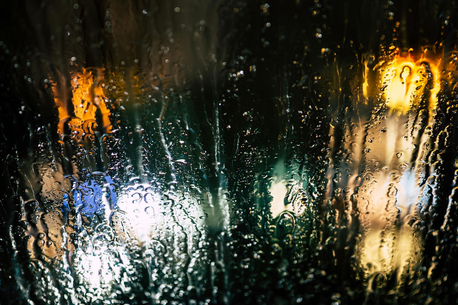 Rain drops on a glass window | Source: Pexels