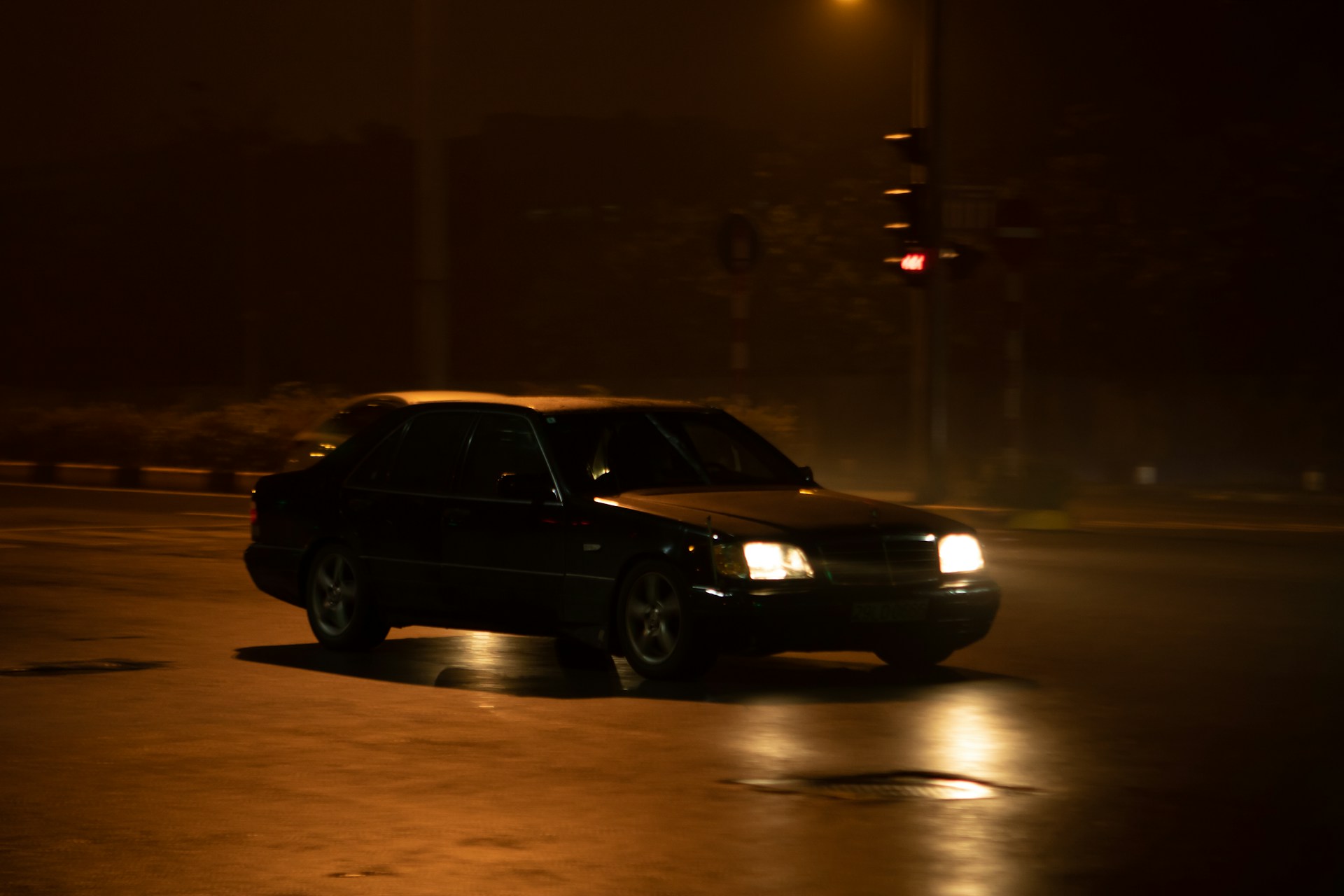 A car on the road at night | Source: Unsplash