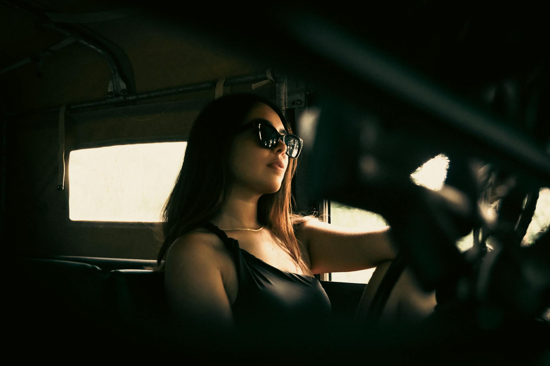 A woman in a car | Source: Pexels