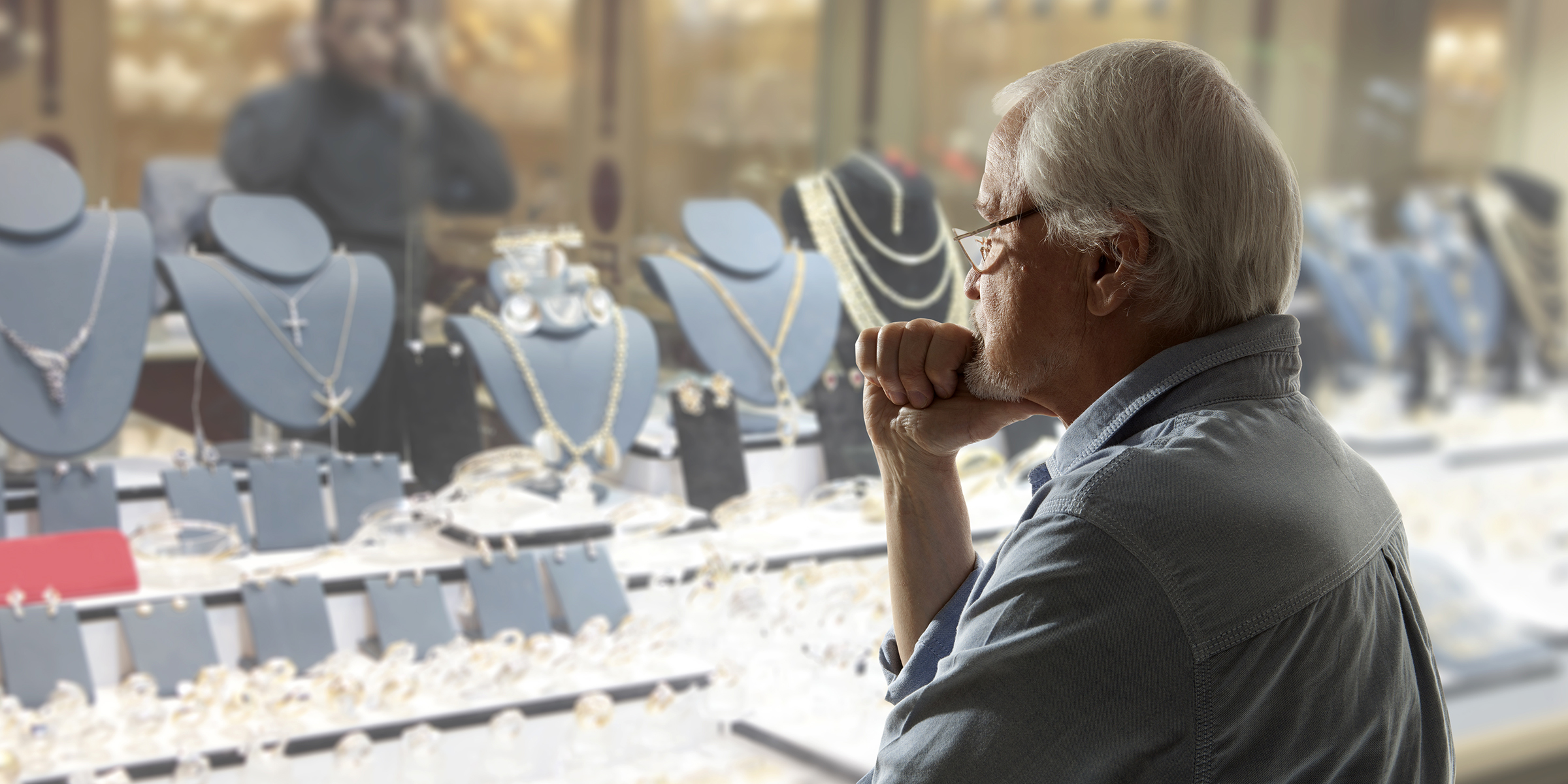 Elderly man at a jewelry shop | Source: Shutterstock