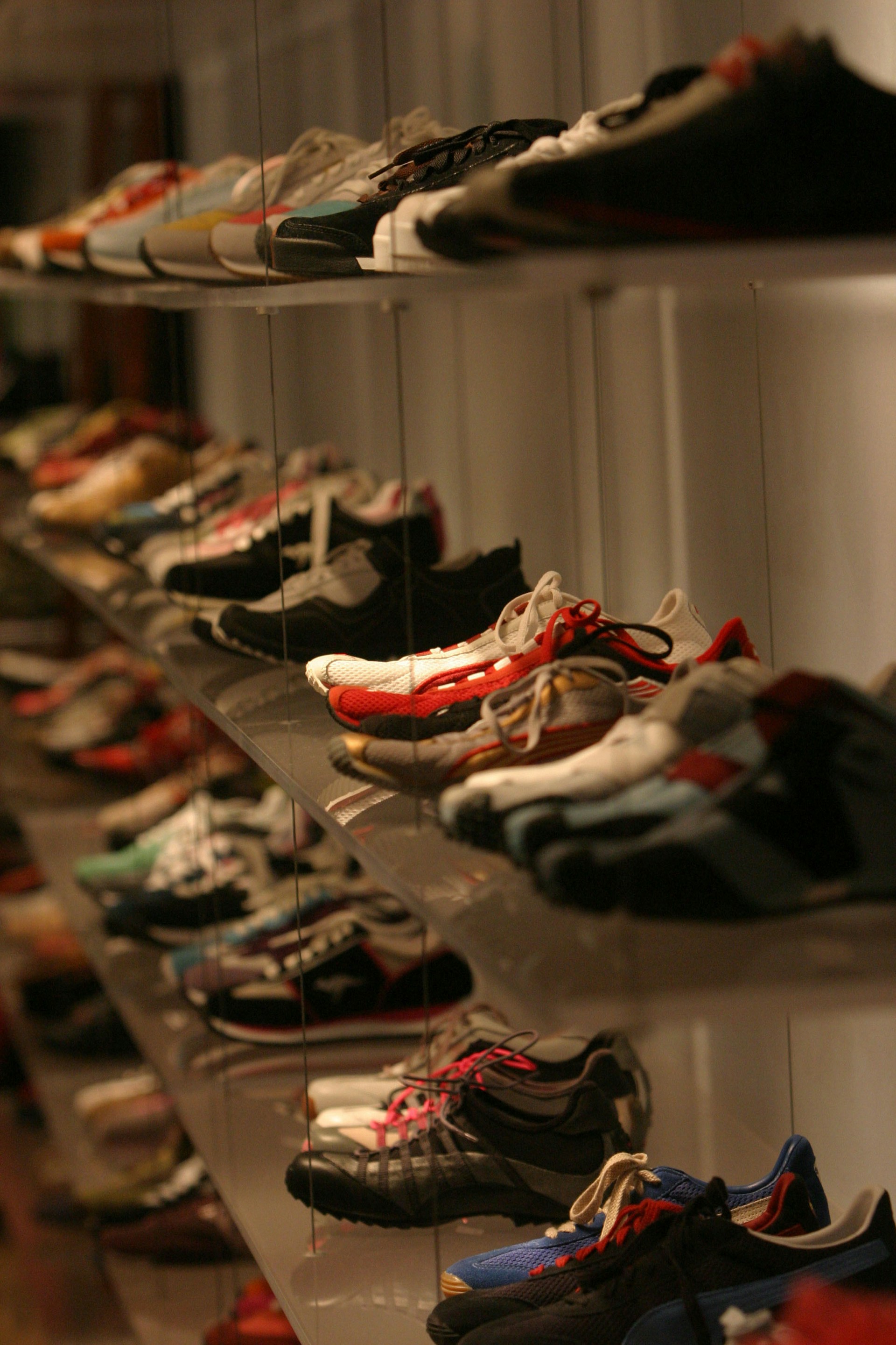 A collection of shoes on a rack | Source: Unsplash