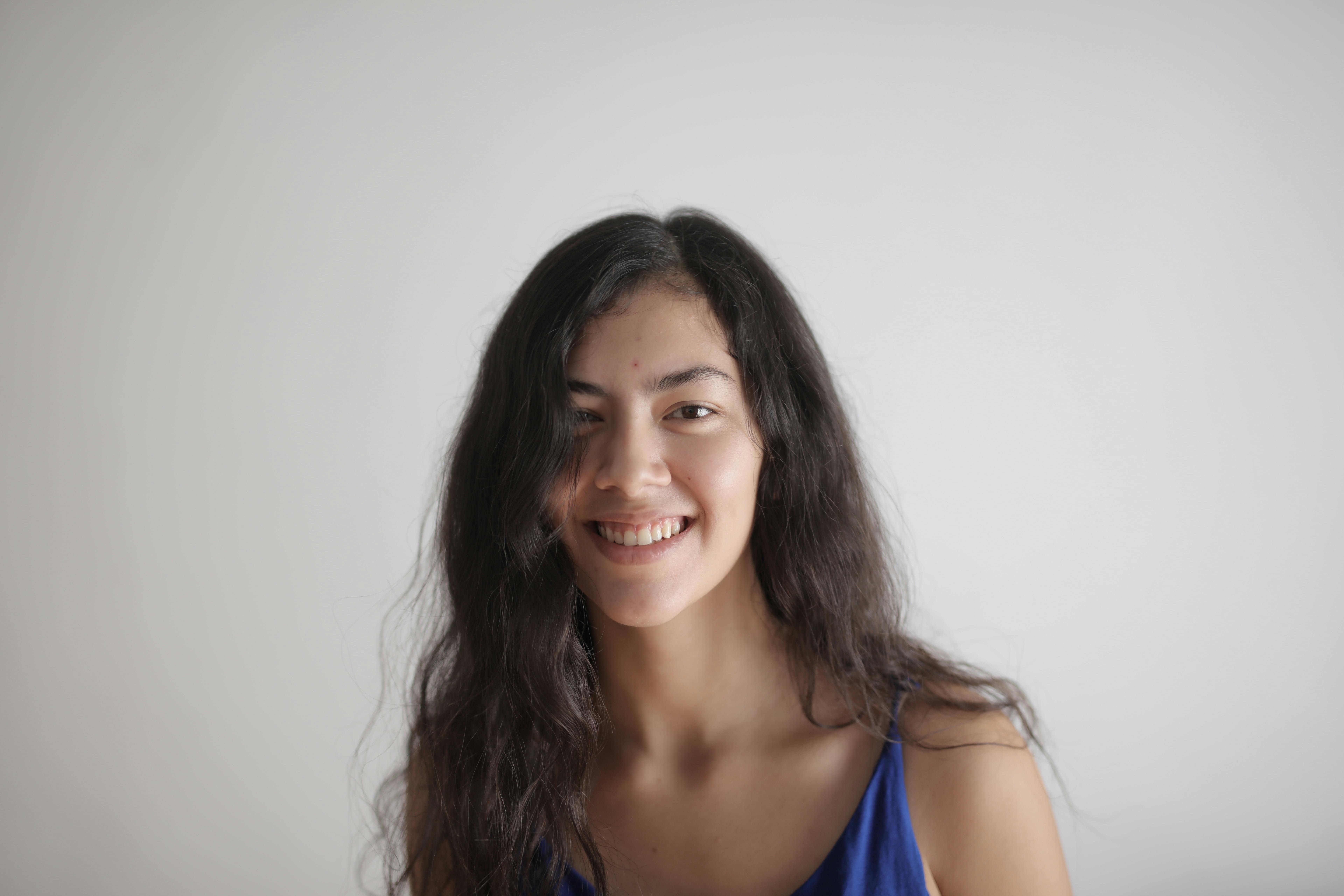 A woman smiling | Source: Pexels