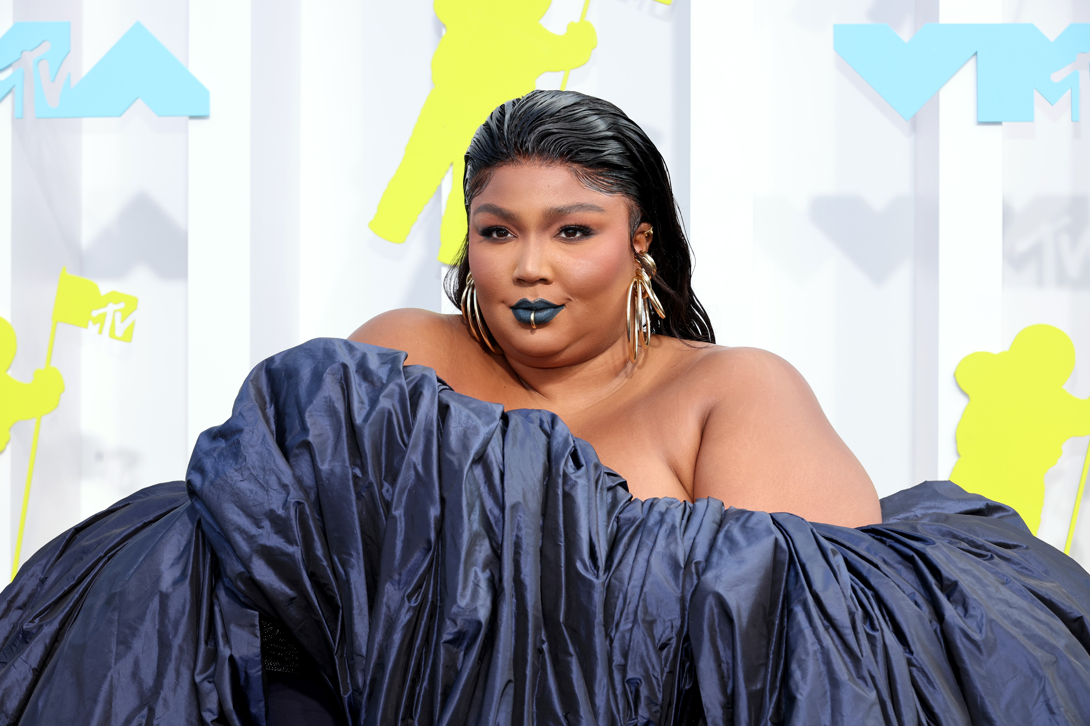Lizzo attends the 2022 MTV VMAs at Prudential Center on August 28, 2022 in Newark, New Jersey. | Source: Getty Images