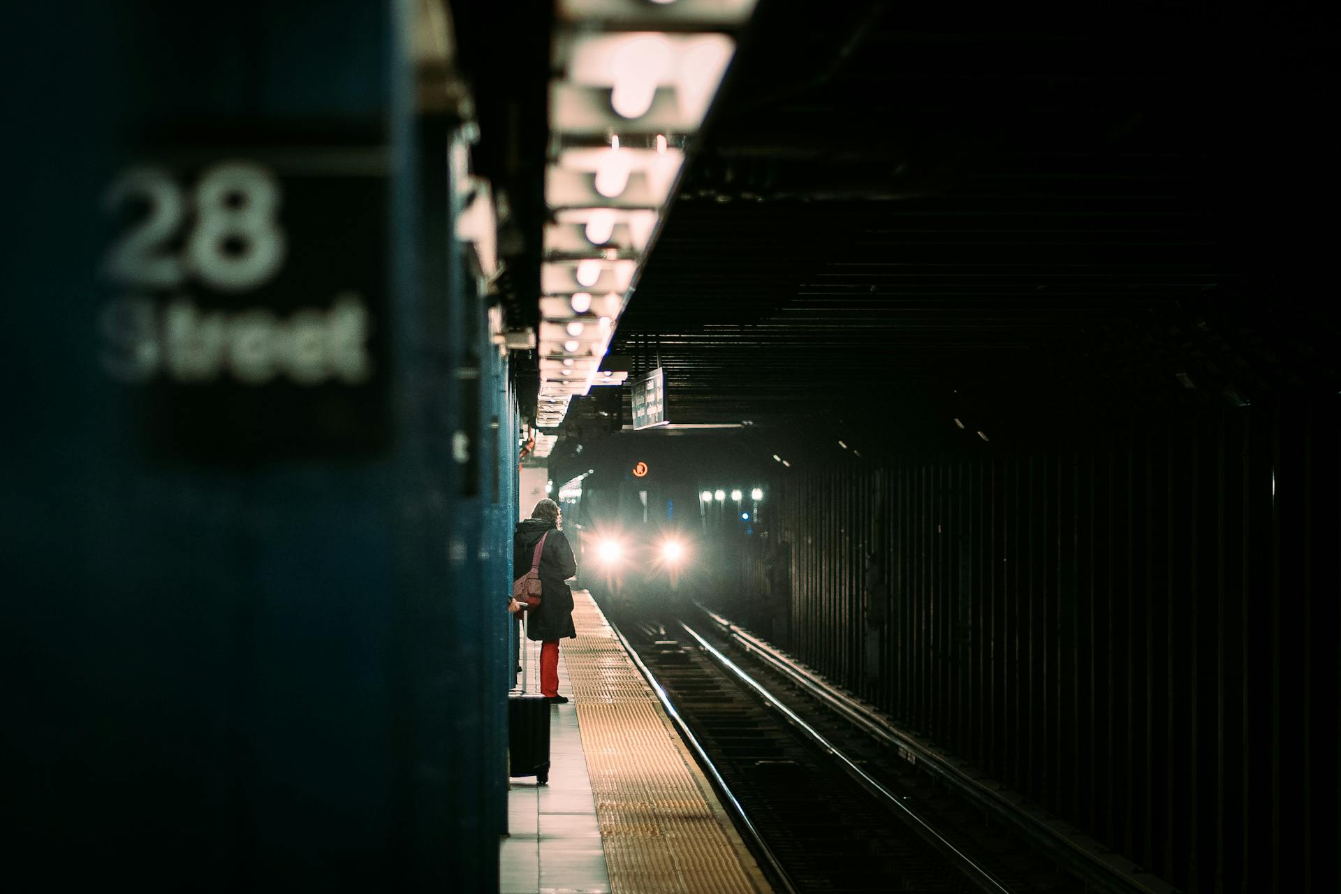 A woman waiting for a subway train | Source: Pexels