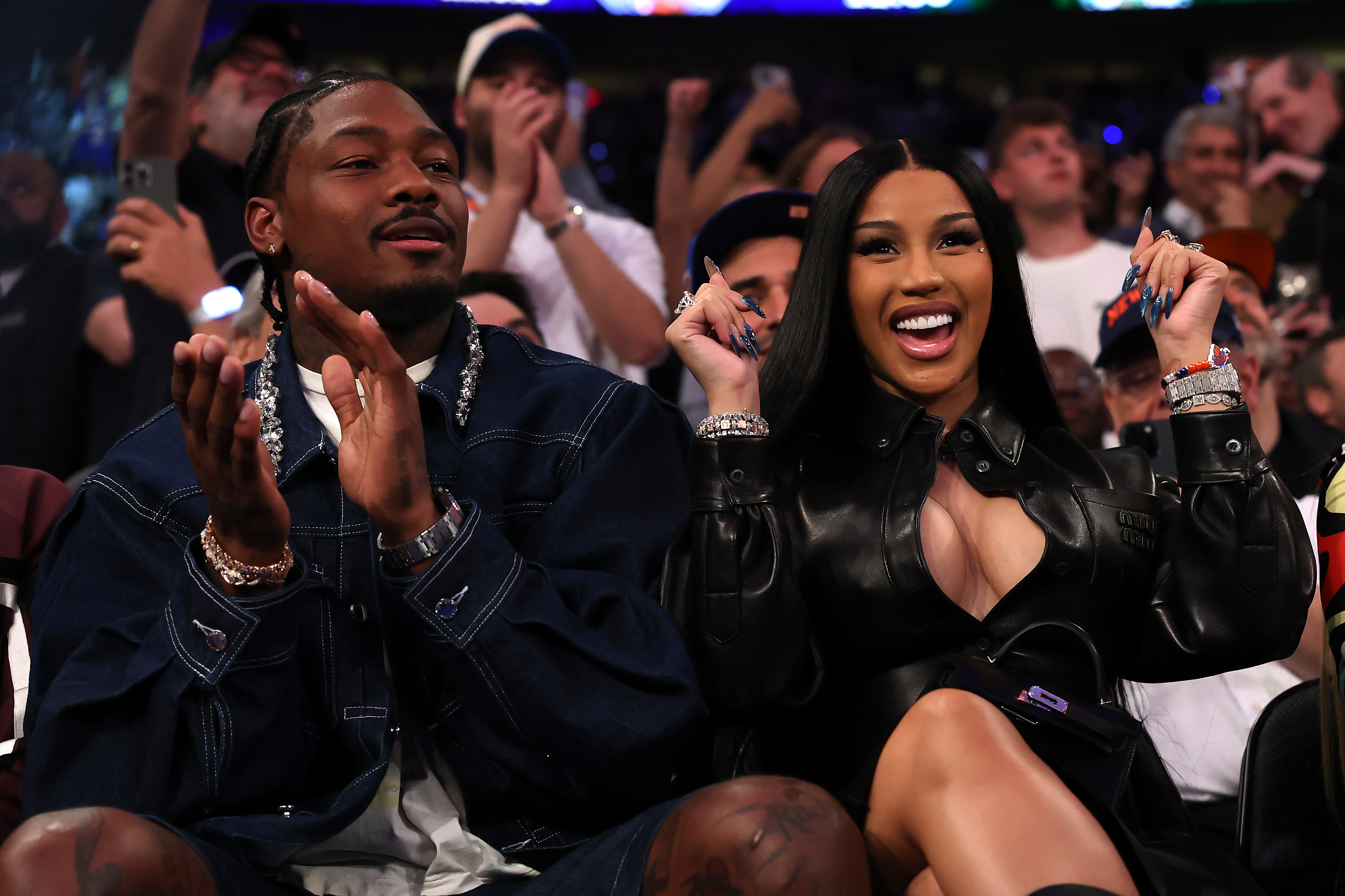 Stefon Diggs and Cardi B during Game Four of the Eastern Conference Second Round NBA Playoffs at Madison Square Garden on May 12, 2025, in New York. | Source: Getty Images