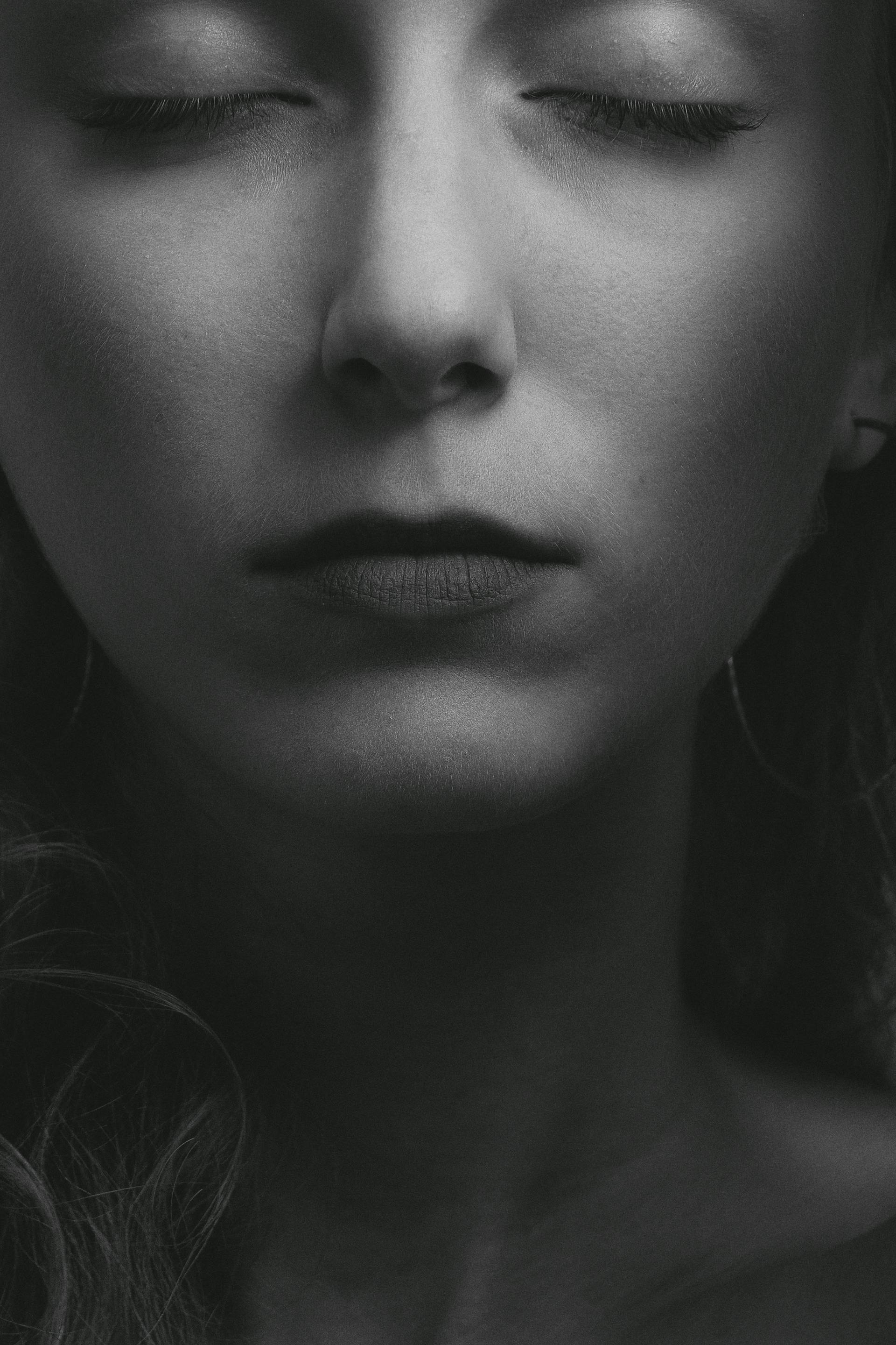 A grayscale photo of a woman's face | Source: Pexels