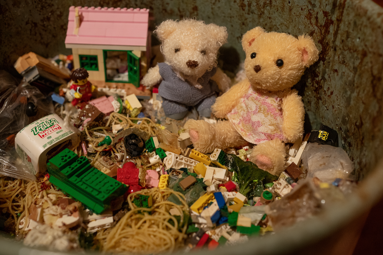 Toys in a trash can | Source: Midjourney