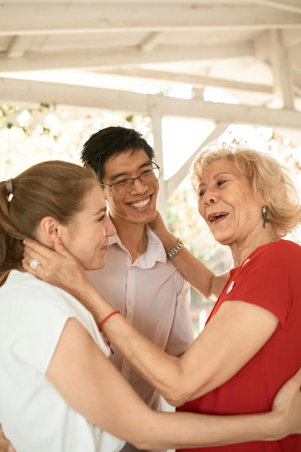 An elderly woman welcoming her family | Source: Pexels