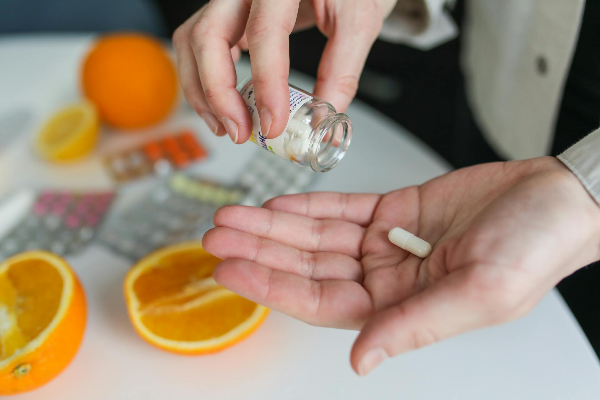 A person taking a pill | Source: Pexels