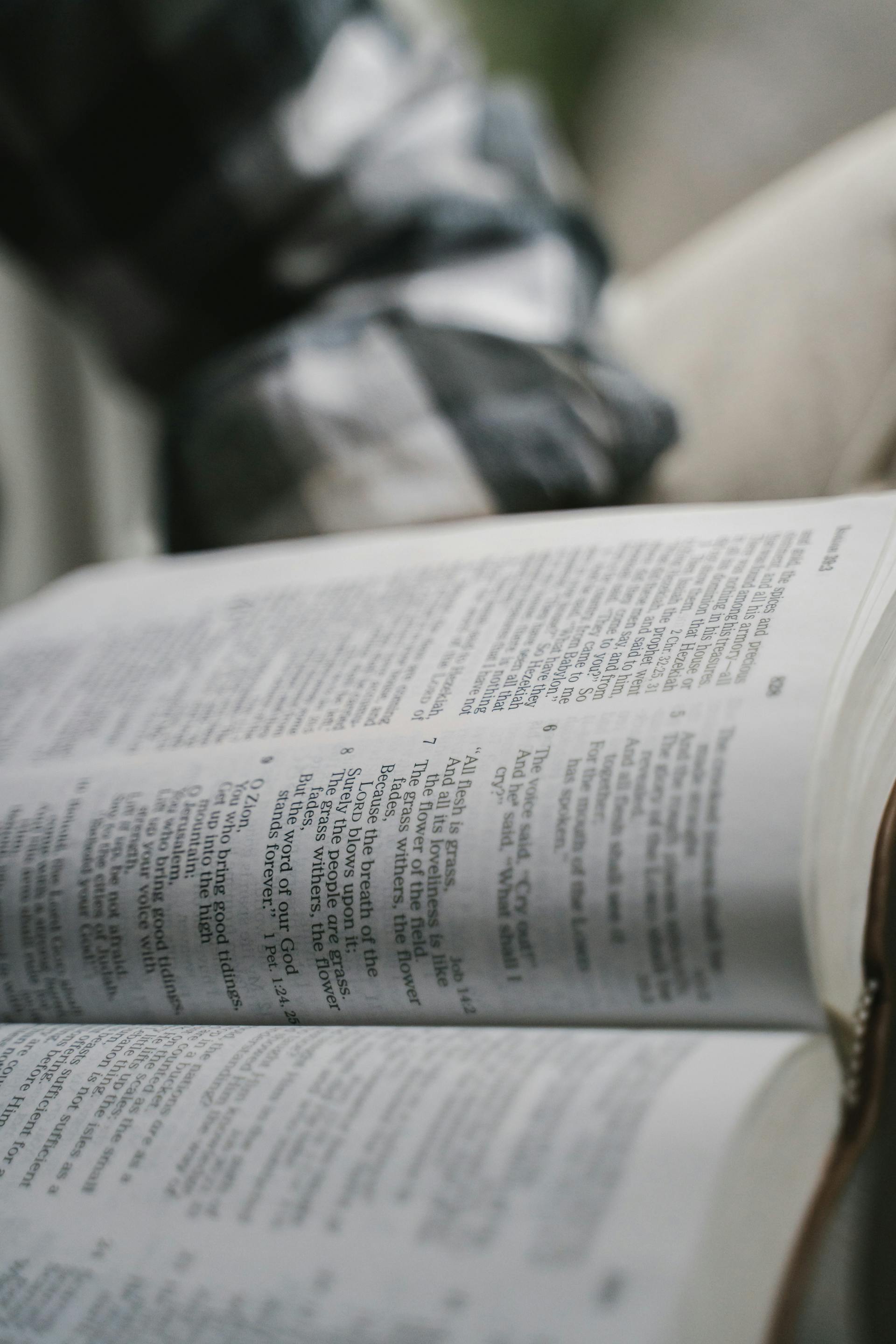 A person paging through a Bible | Source: Pexels