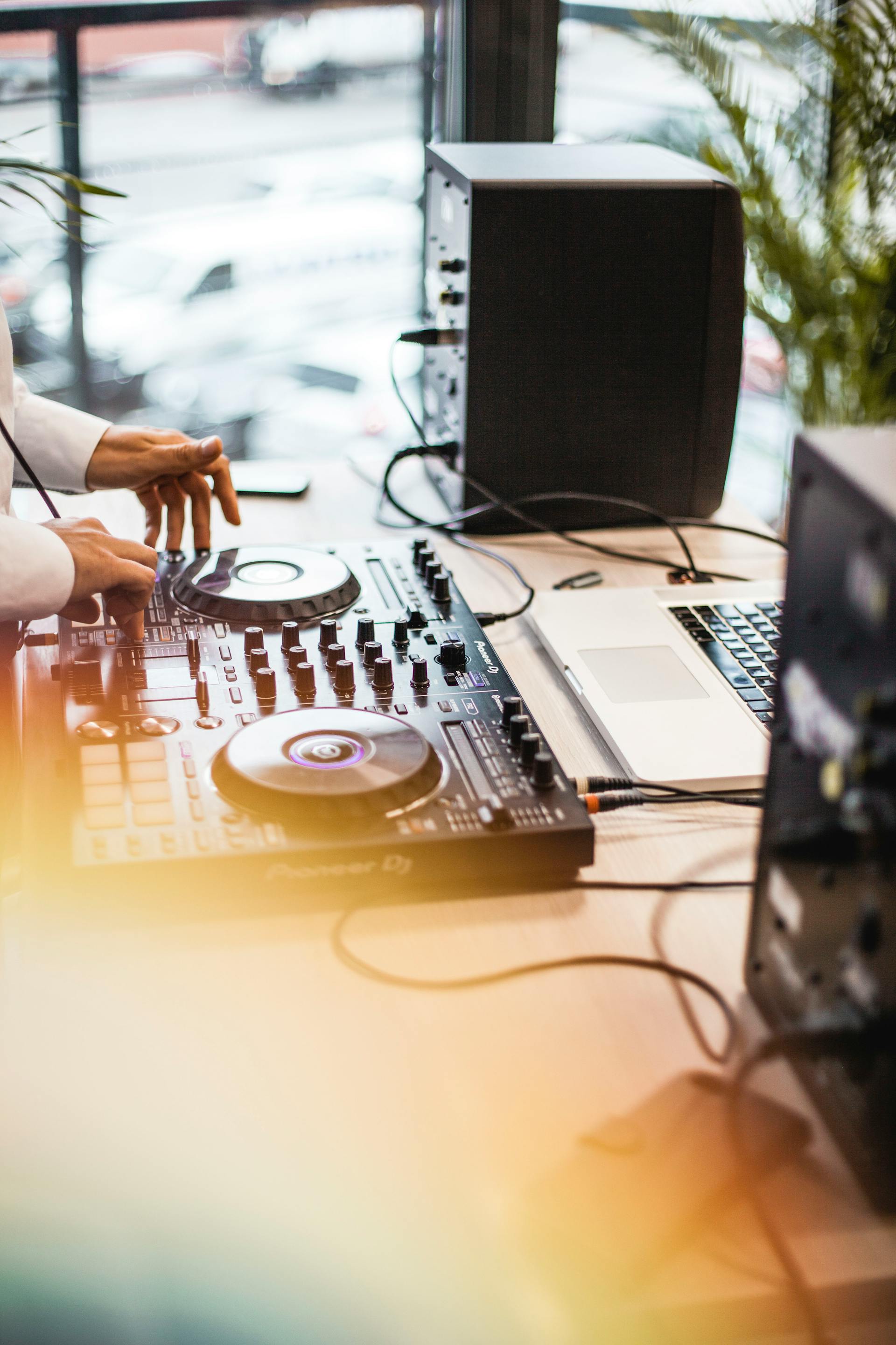 A DJ using sound equipment | Source: Pexels