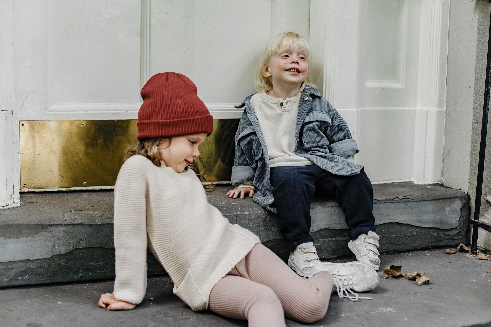 Two girls sitting together | Source: Pexels