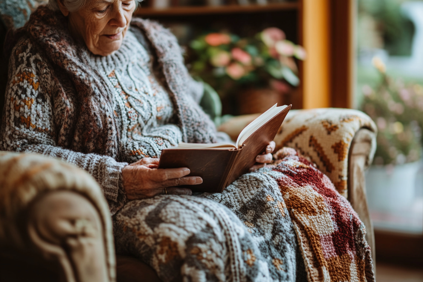 An elderly woman reading a book | Source: Midjourney