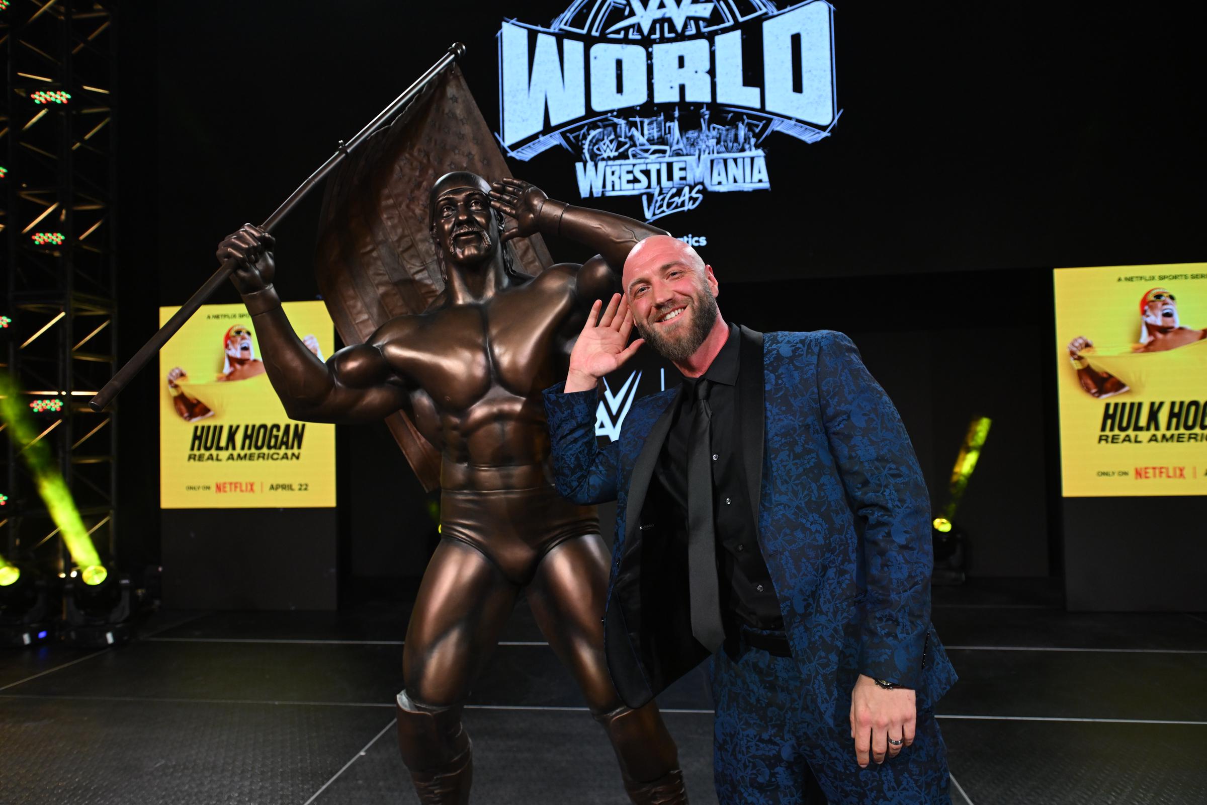 Nick Hogan on stage with the Hulk Hogan statue after a viewing of the "Hulk Hogan: Real American" Netflix documentary at WWE World at Las Vegas Convention Center on April 16, 2026 in Las Vegas, Nevada. | Source: Getty Images