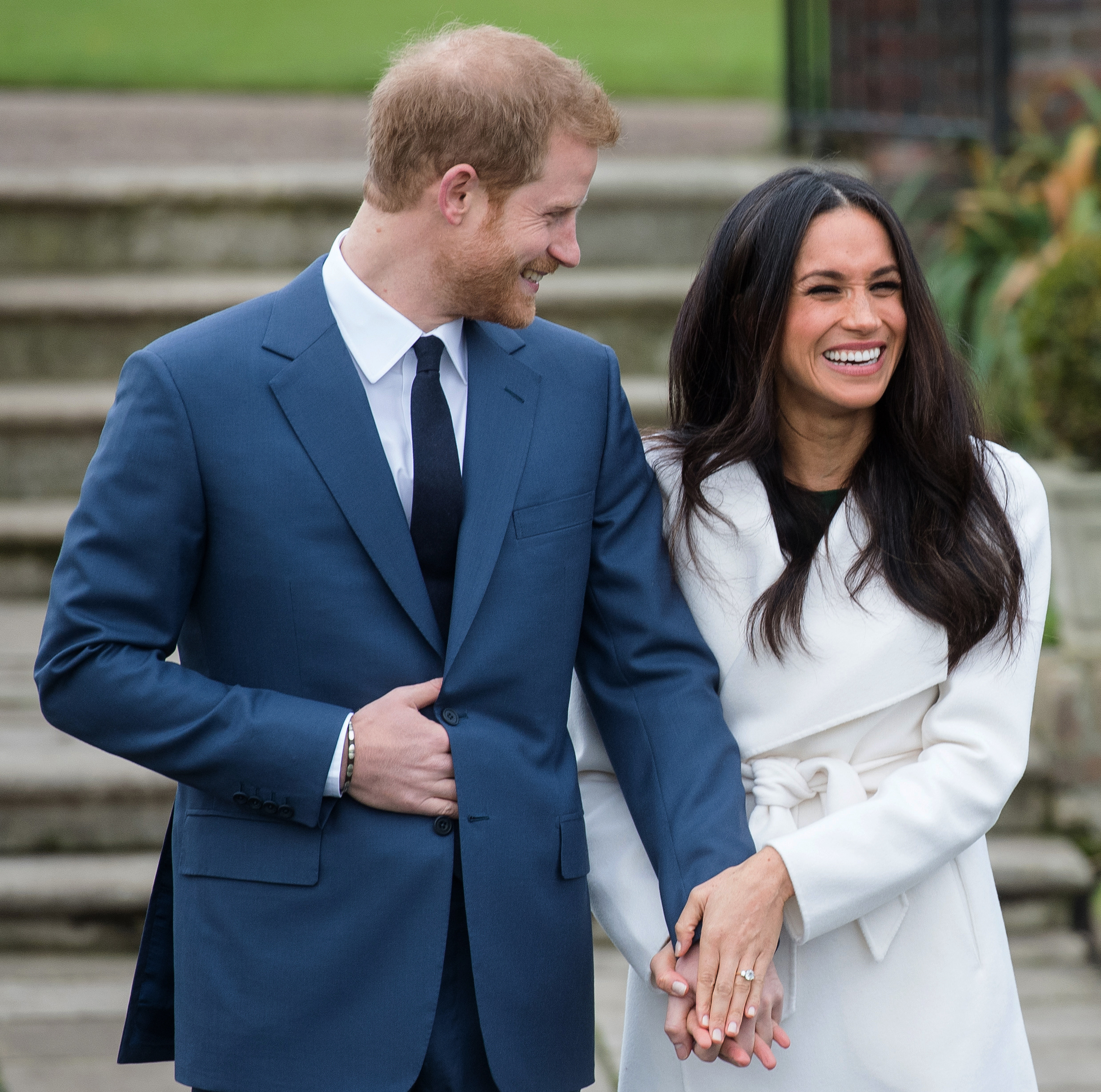 Prince Harry and Meghan Markle during a photocall in the Sunken Gardens at Kensington Palace following the announcement of their engagement on November 27, 2017, in London, England. | Source: Getty Images