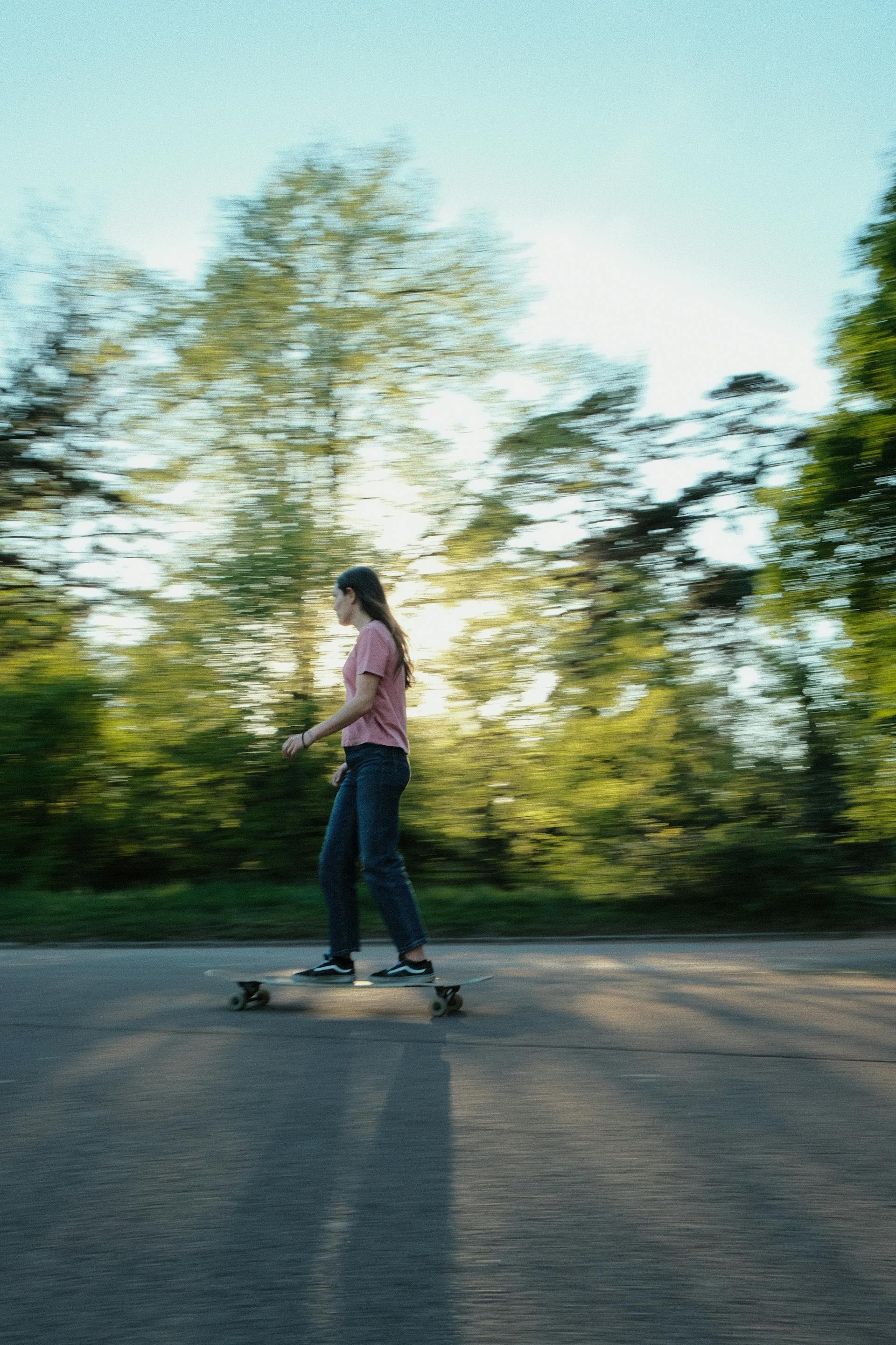 A teen girl on a skateboard | Source: Pexels