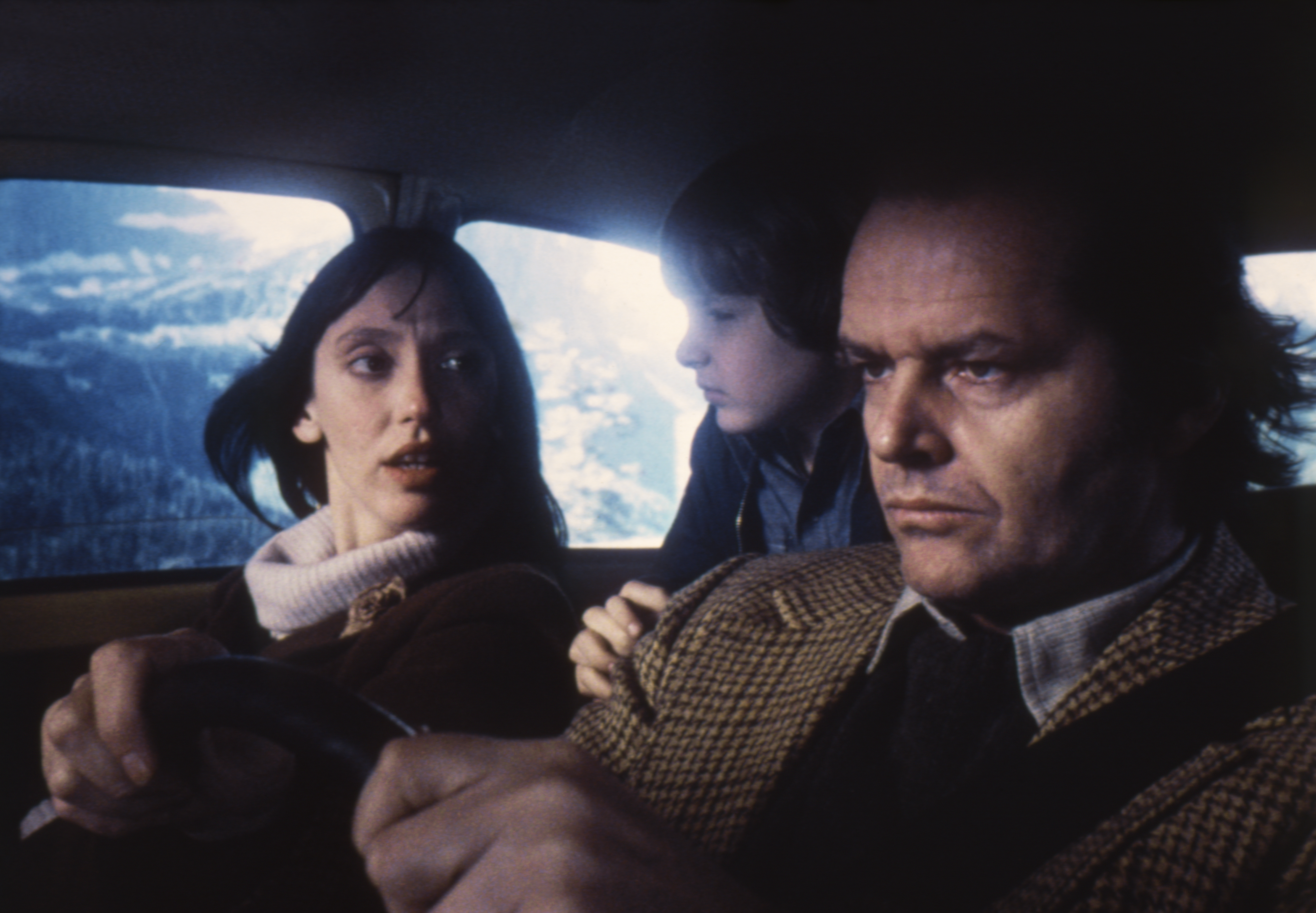Actors Jack Nicholson, Danny Lloyd, and Shelley Duvall on the set of "The Shining," based on the novel by Stephen King and directed by Stanley Kubrick. | Source: Getty Images