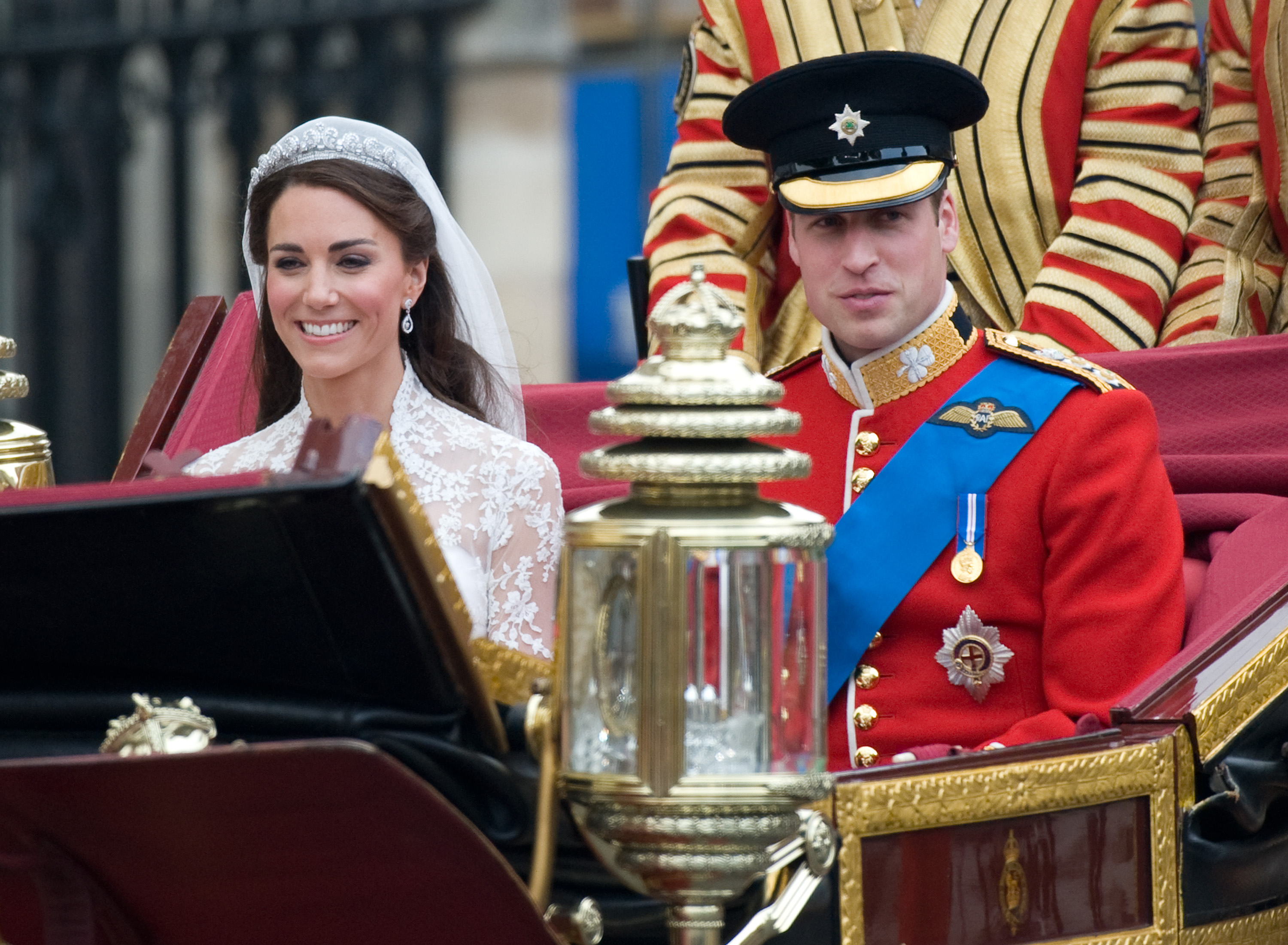 Catherine, Duchess of Cambridge and Prince William, Duke of Cambridge leave in a carriage after their Wedding at Westminster Abbey on April 29, 2011 in London, England. | Source: Getty Images