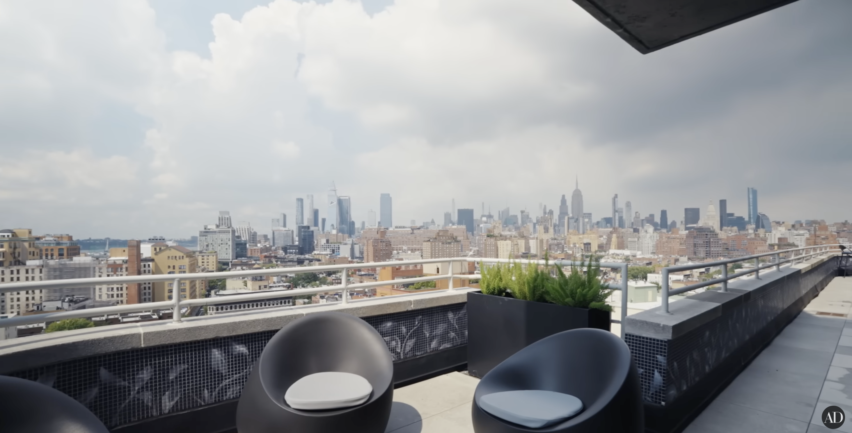 The outdoor terrace of Christopher Meloni's apartment | Source: YouTube/Architectural Digest