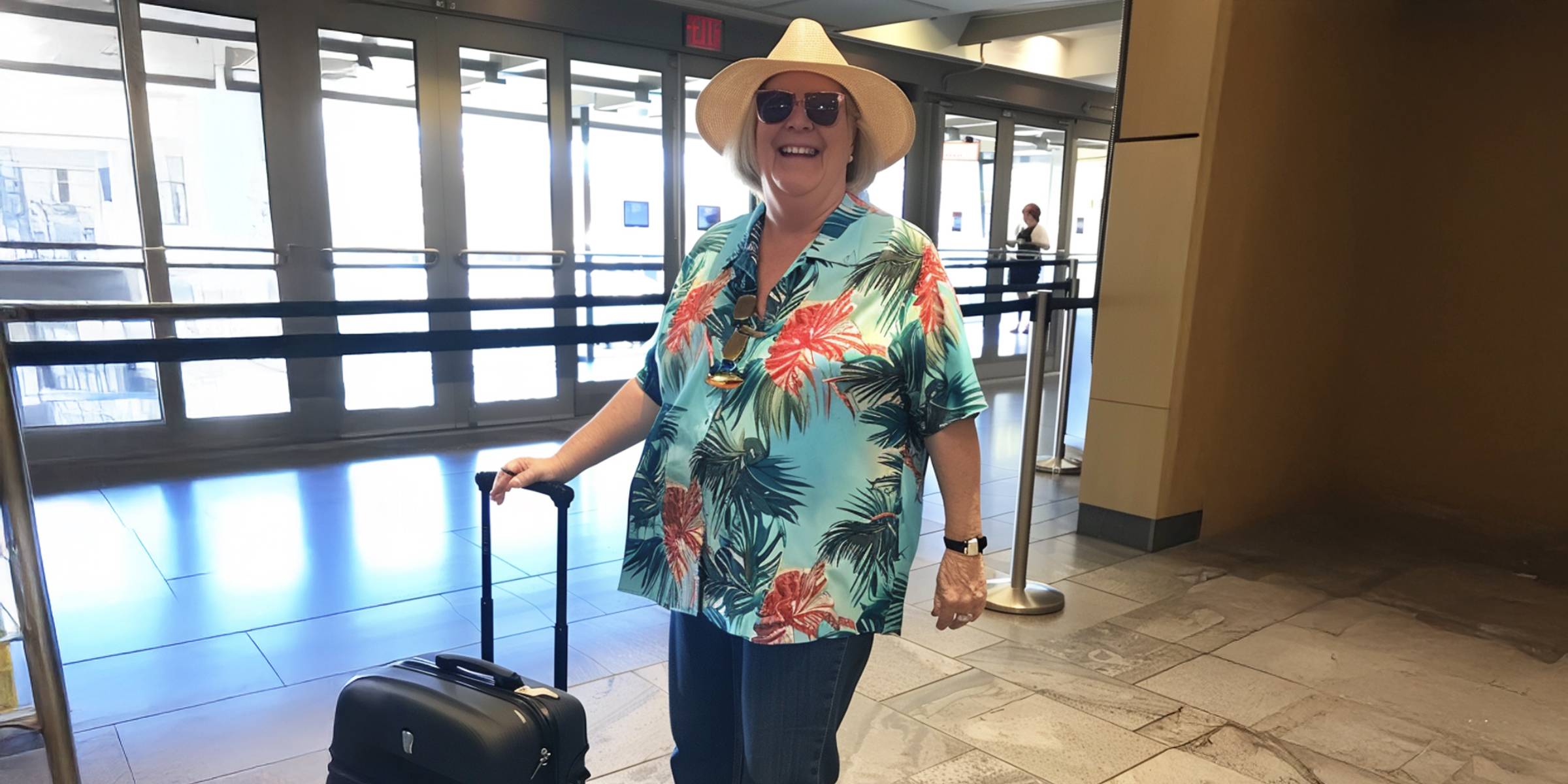 A woman standing in an airport | Source: AmoMama