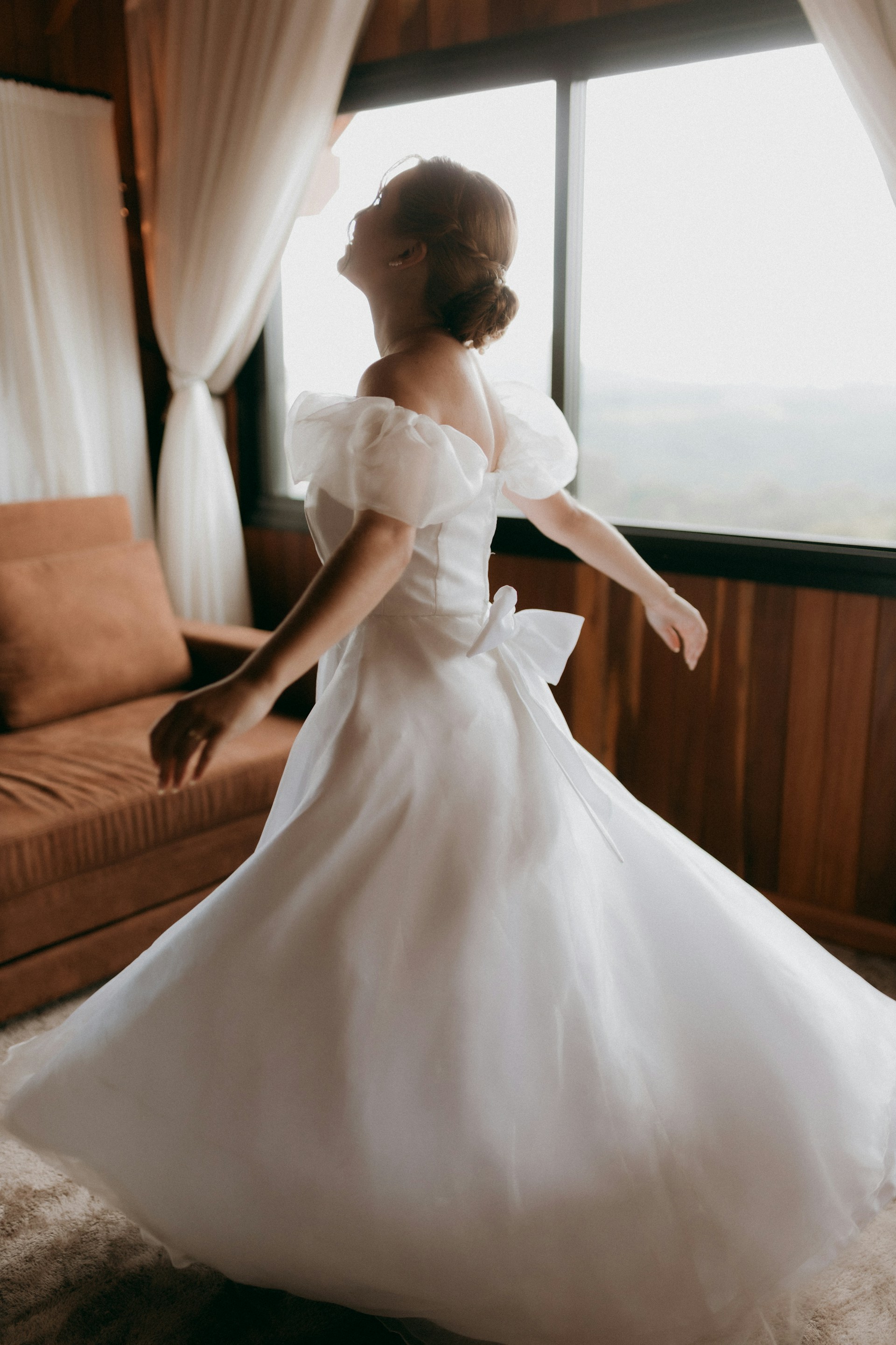My Sister Excluded My Son from Her Wedding After He Made Her Dress, but Still Expected to Wear It – We Gave Her One Condition to Keep It 7 A delighted woman wearing a white wedding gown | Source: Unsplash