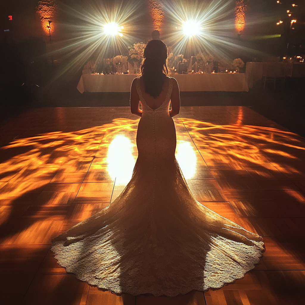 Bride standing alone on the dance floor | Source: Midjourney